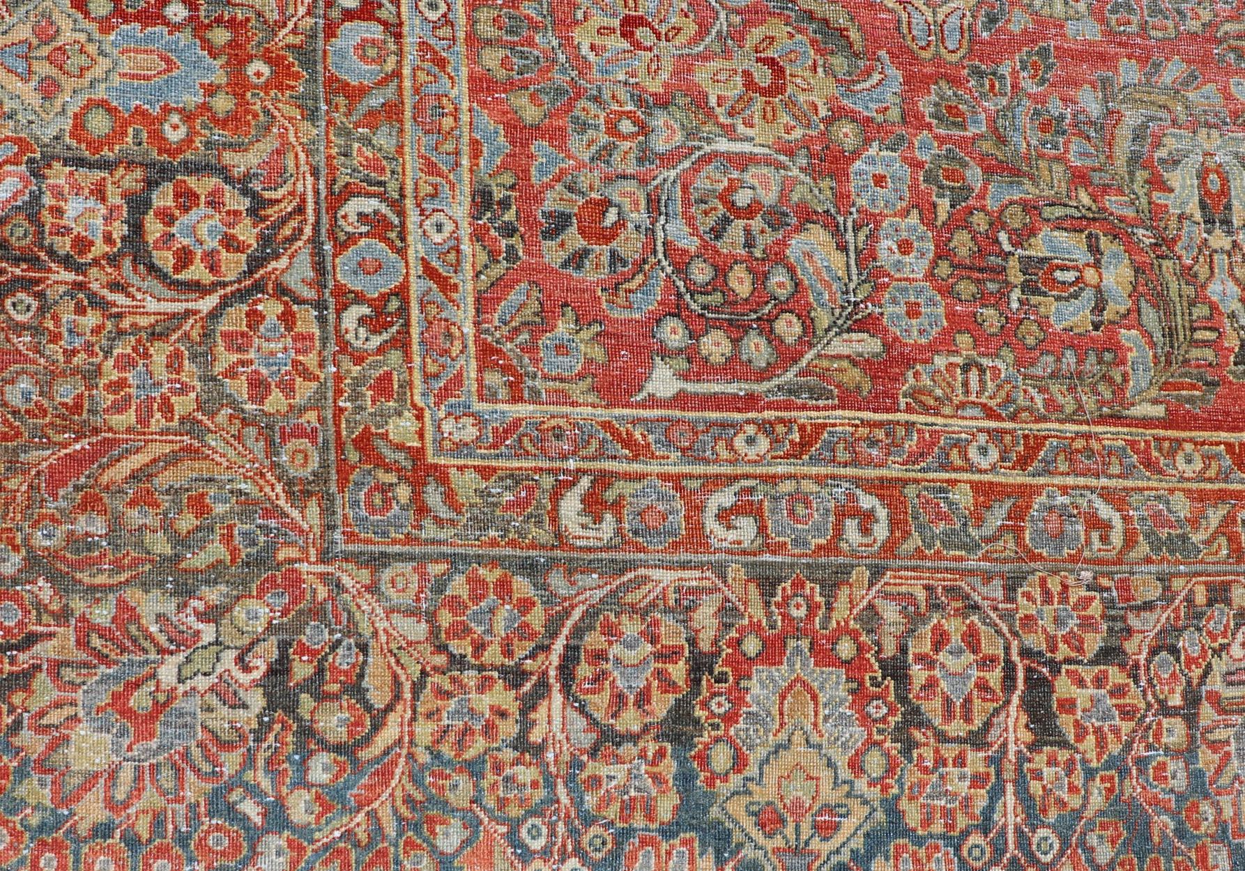 Hand-Knotted Antique Persian Sarouk with All-Over Floral Design on a Light Red Field For Sale