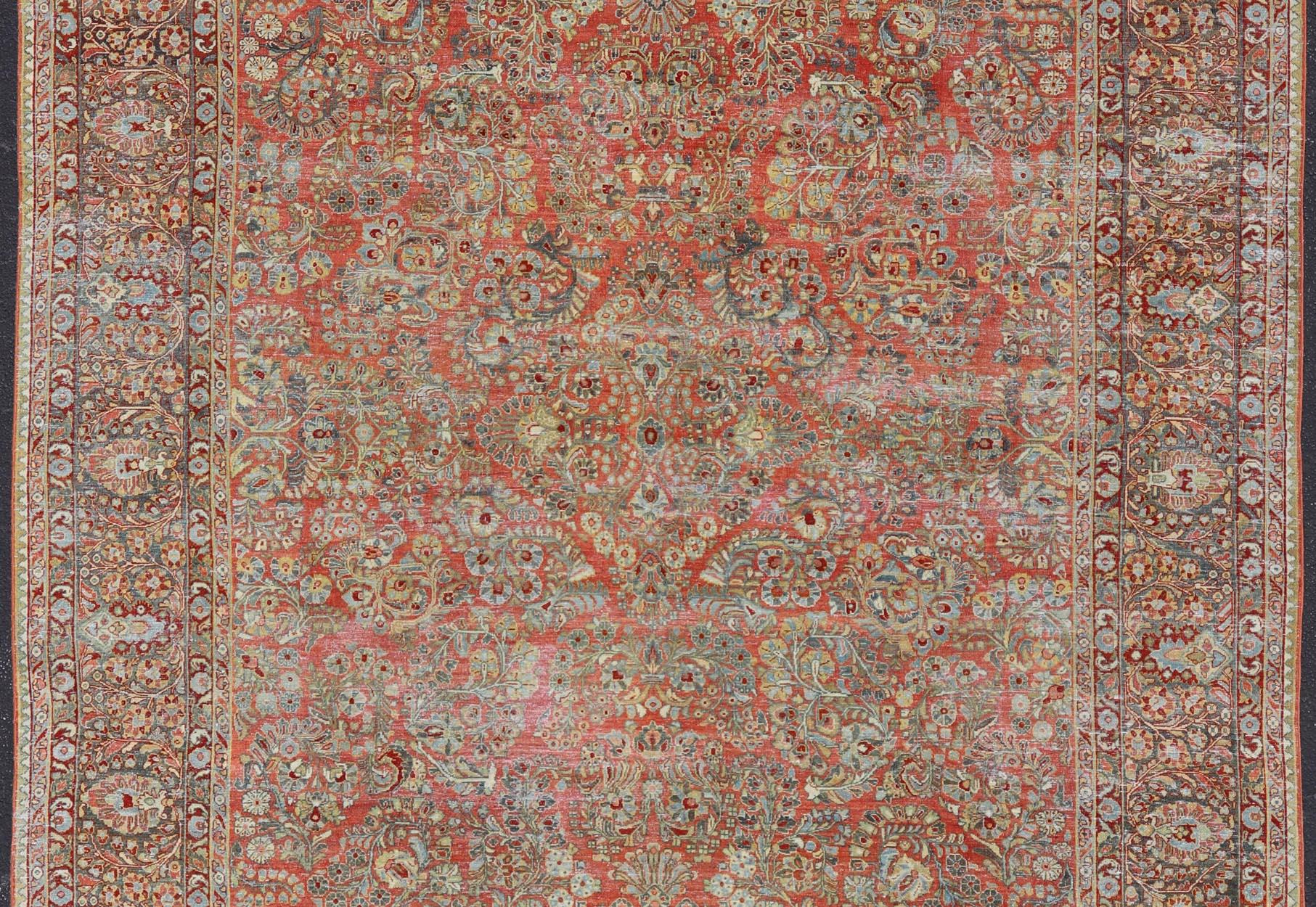 Antique Persian Sarouk with All-Over Floral Design on a Light Red Field For Sale 1