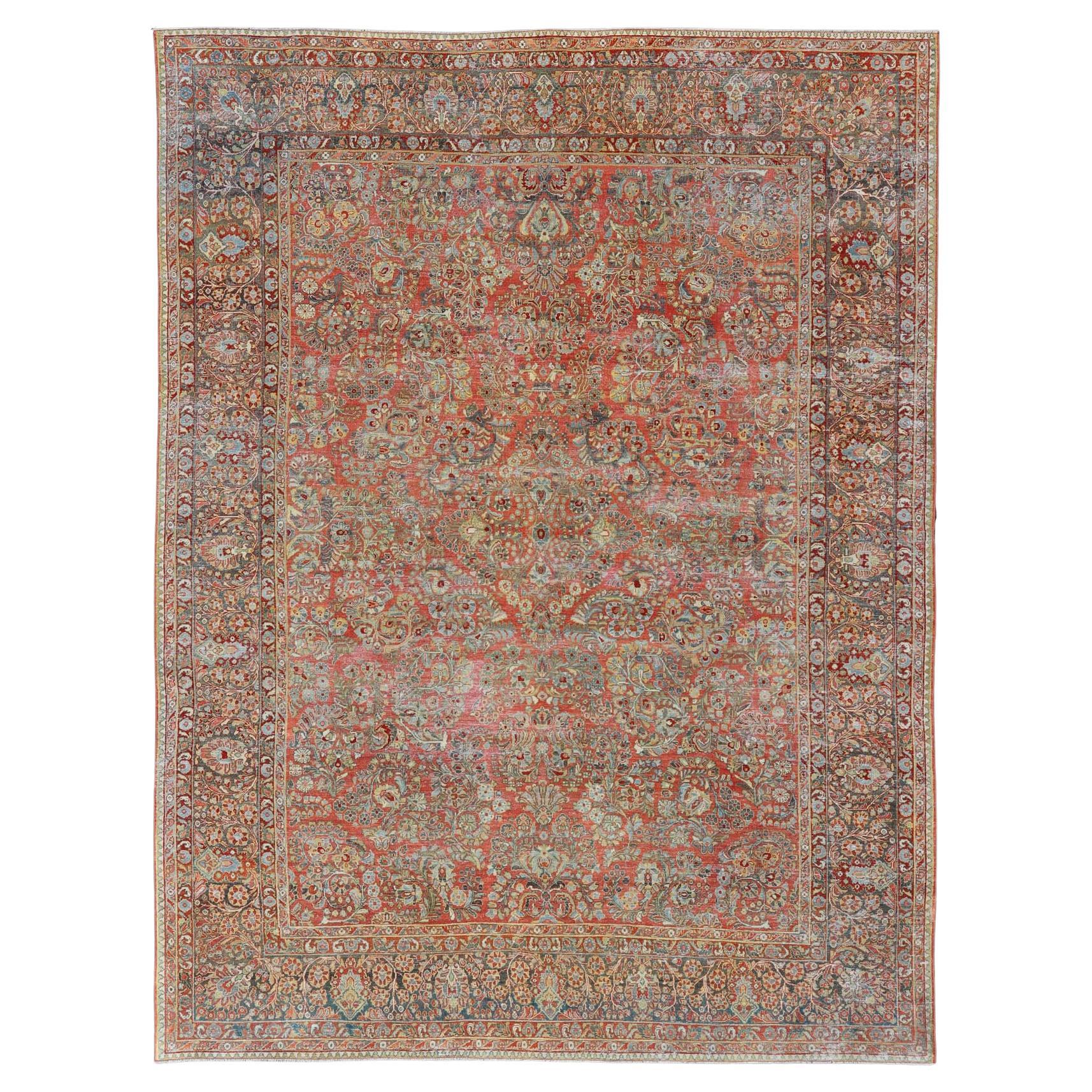 Antique Persian Sarouk with All-Over Floral Design on a Light Red Field