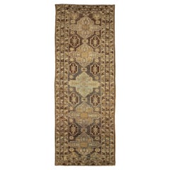 Antique Persian Saveh Runner Rug with Geometric & Tribal Design on a Brown Field