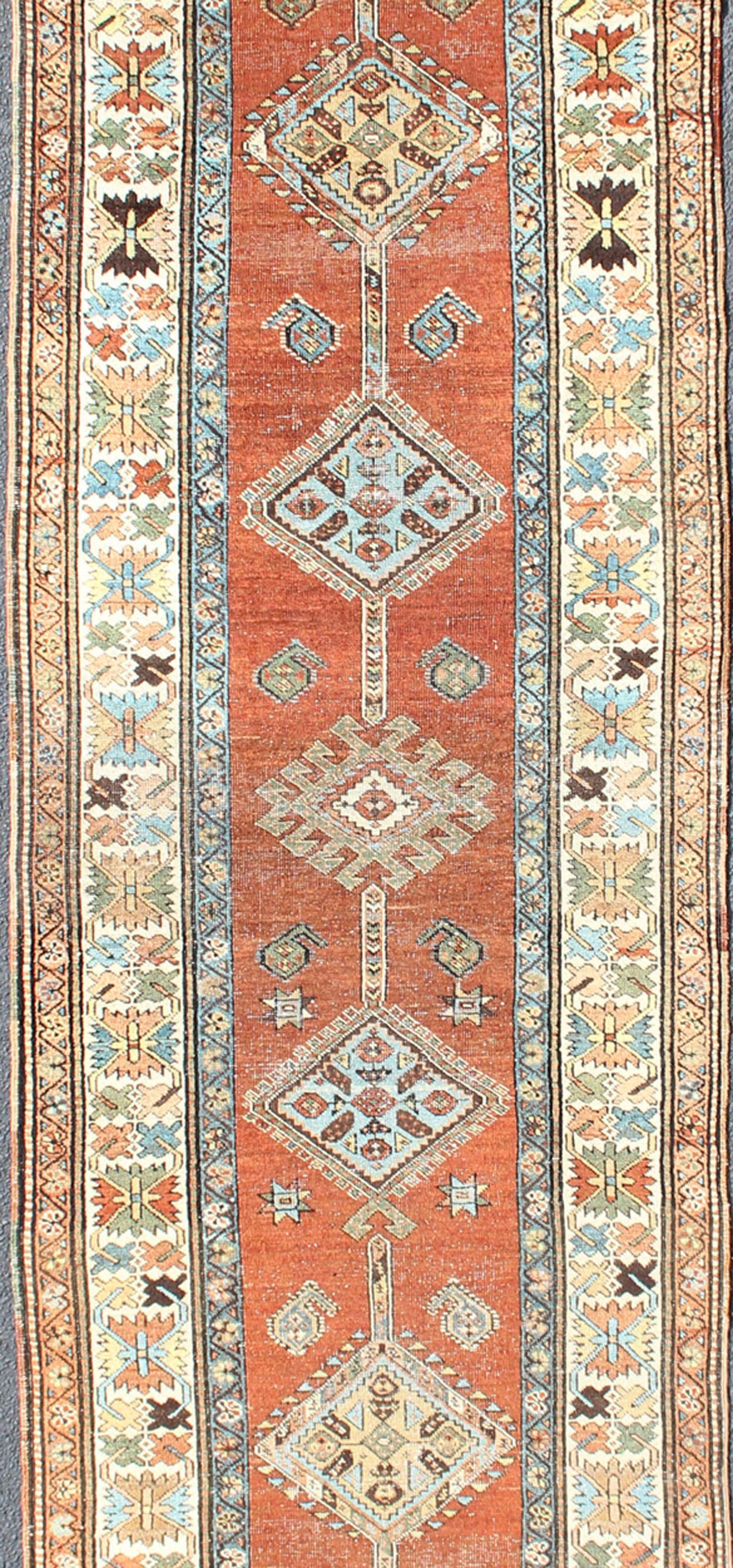 Serapi Antique Persian Searpi Runner with Geometric Medallions in Orange, Blue, Ivory For Sale