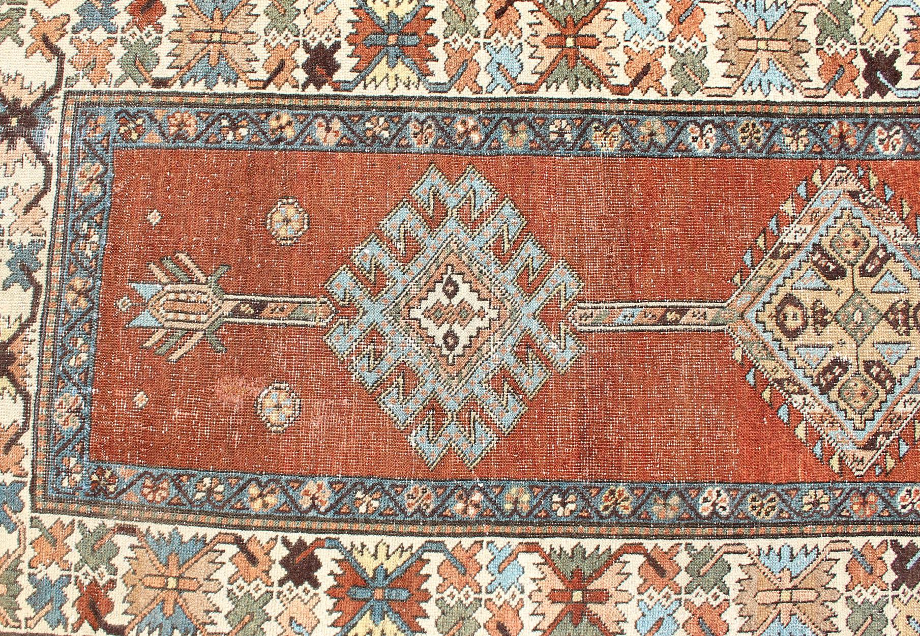 Antique Persian Searpi Runner with Geometric Medallions in Orange, Blue, Ivory In Good Condition For Sale In Atlanta, GA