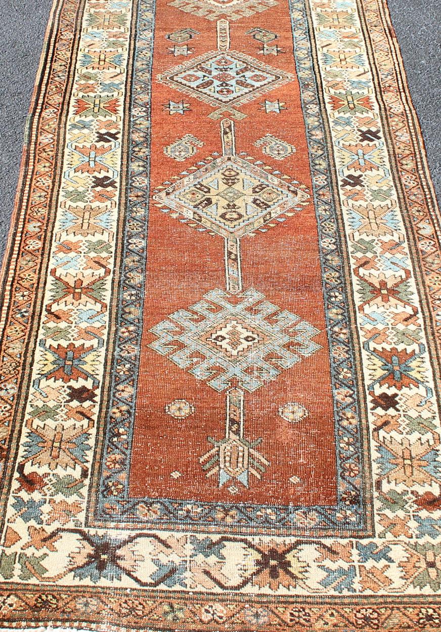 Wool Antique Persian Searpi Runner with Geometric Medallions in Orange, Blue, Ivory For Sale