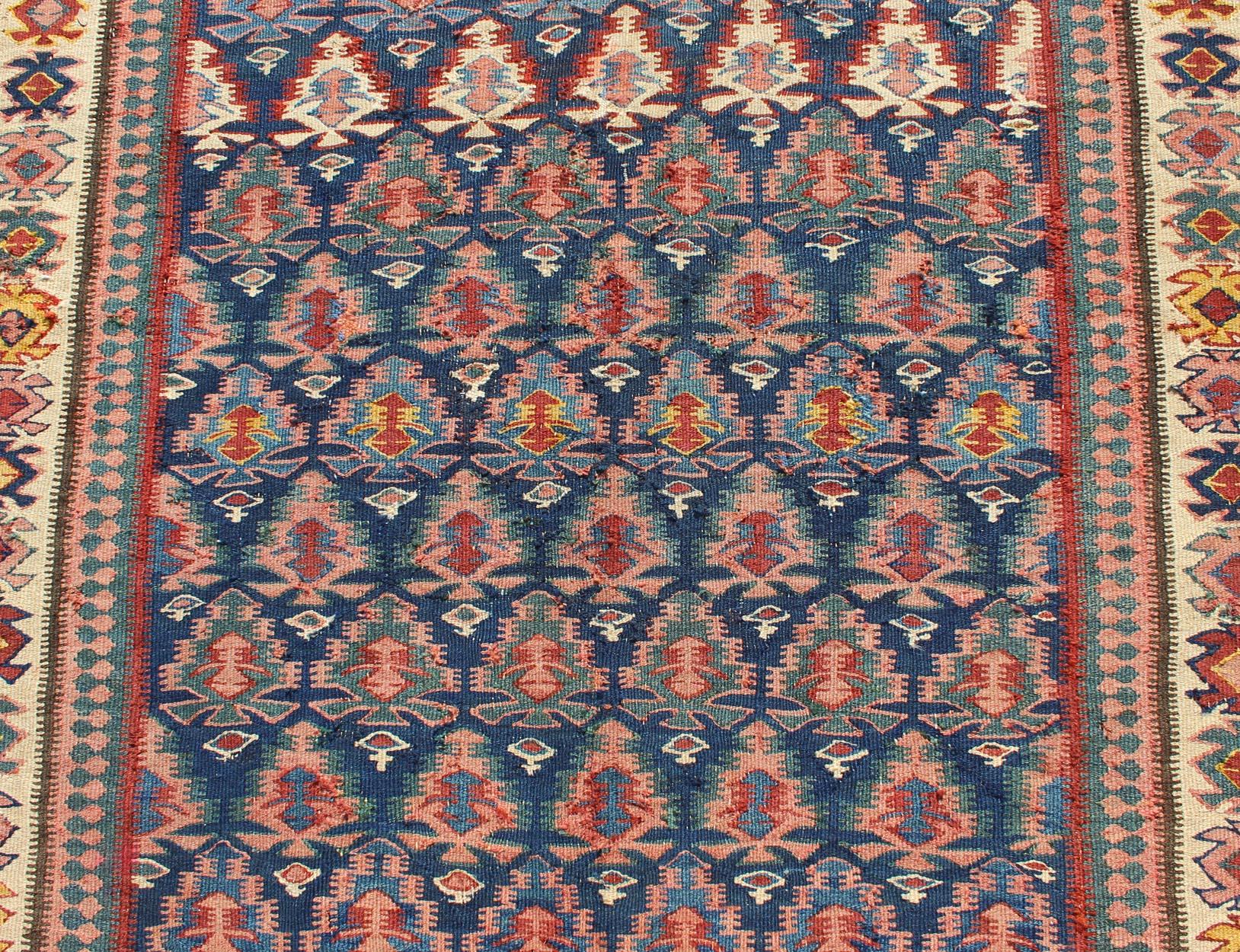 Early 20th Century Antique Persian Seneh Kilim Gallery Runner with Geometric and Floral Design For Sale