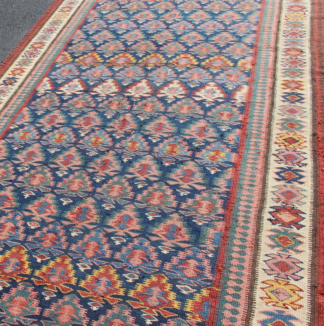 Antique Persian Seneh Kilim Gallery Rug with Geometric and Floral Design For Sale 1