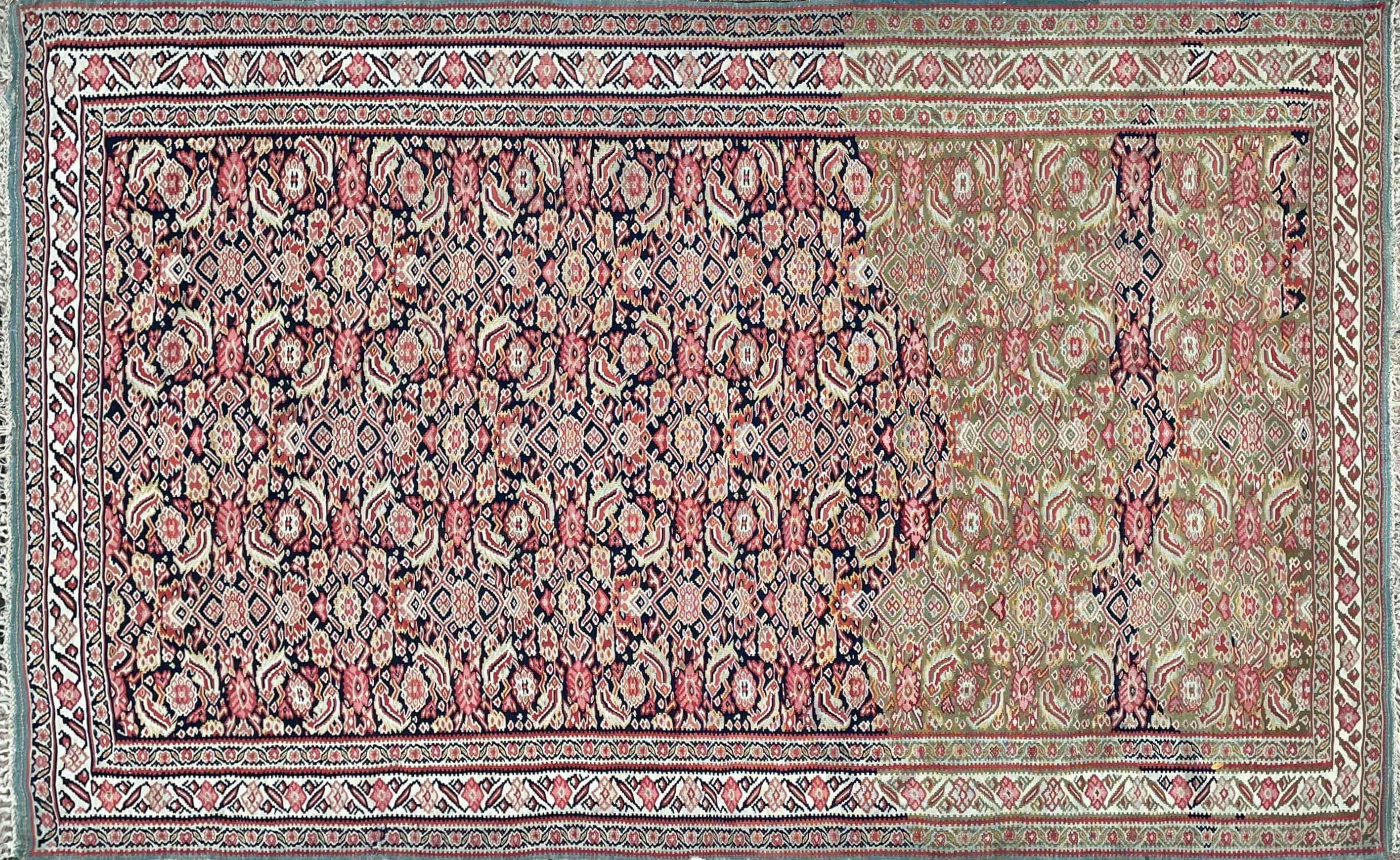 Enhancing the description of the Antique Persian Senneh Kilim Rug:
Adorning your space with an exquisite piece of textile art, we present an Antique Persian Senneh Kilim Rug from the early 20th century. This fine creation offers a visual tapestry of
