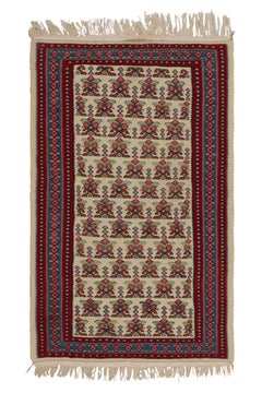 Antico tappeto persiano Senneh con motivi tribali beige, rossi e verdi di Rug & Kilim