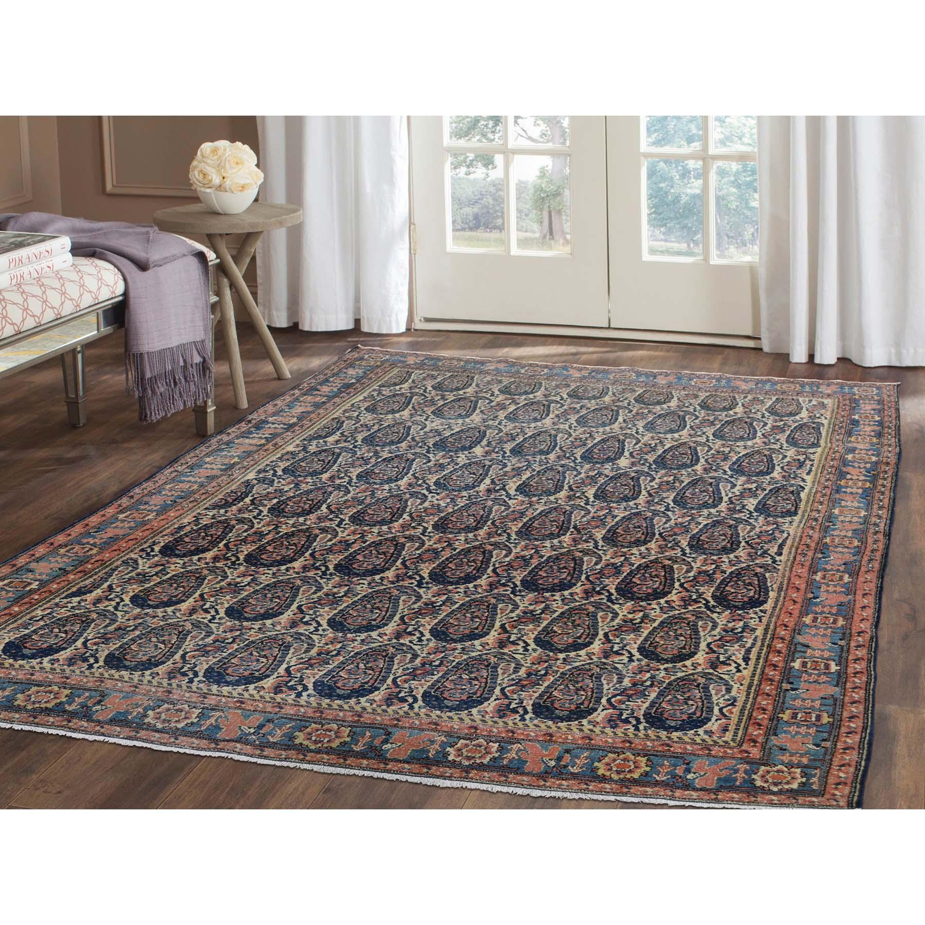 This is a truly genuine one-of-a-kind antique Persian Senneh paisley design excellent condition hand knotted rug. It has been knotted for months and months in the centuries-old Persian weaving craftsmanship techniques by expert artisans.


Primary