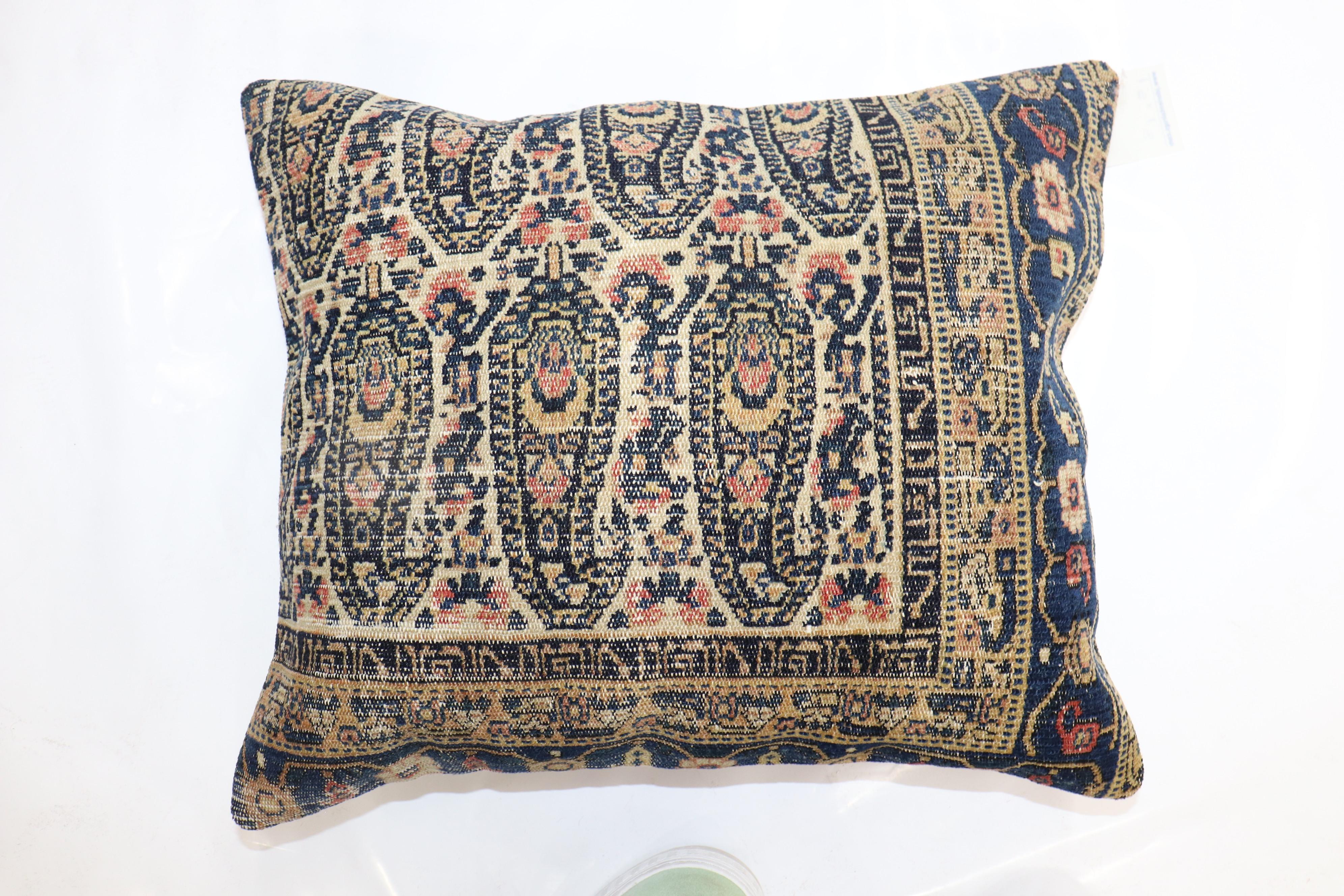 Pillow made from a finely woven Persian Senneh rug.

Measures: 17'' x 20''.