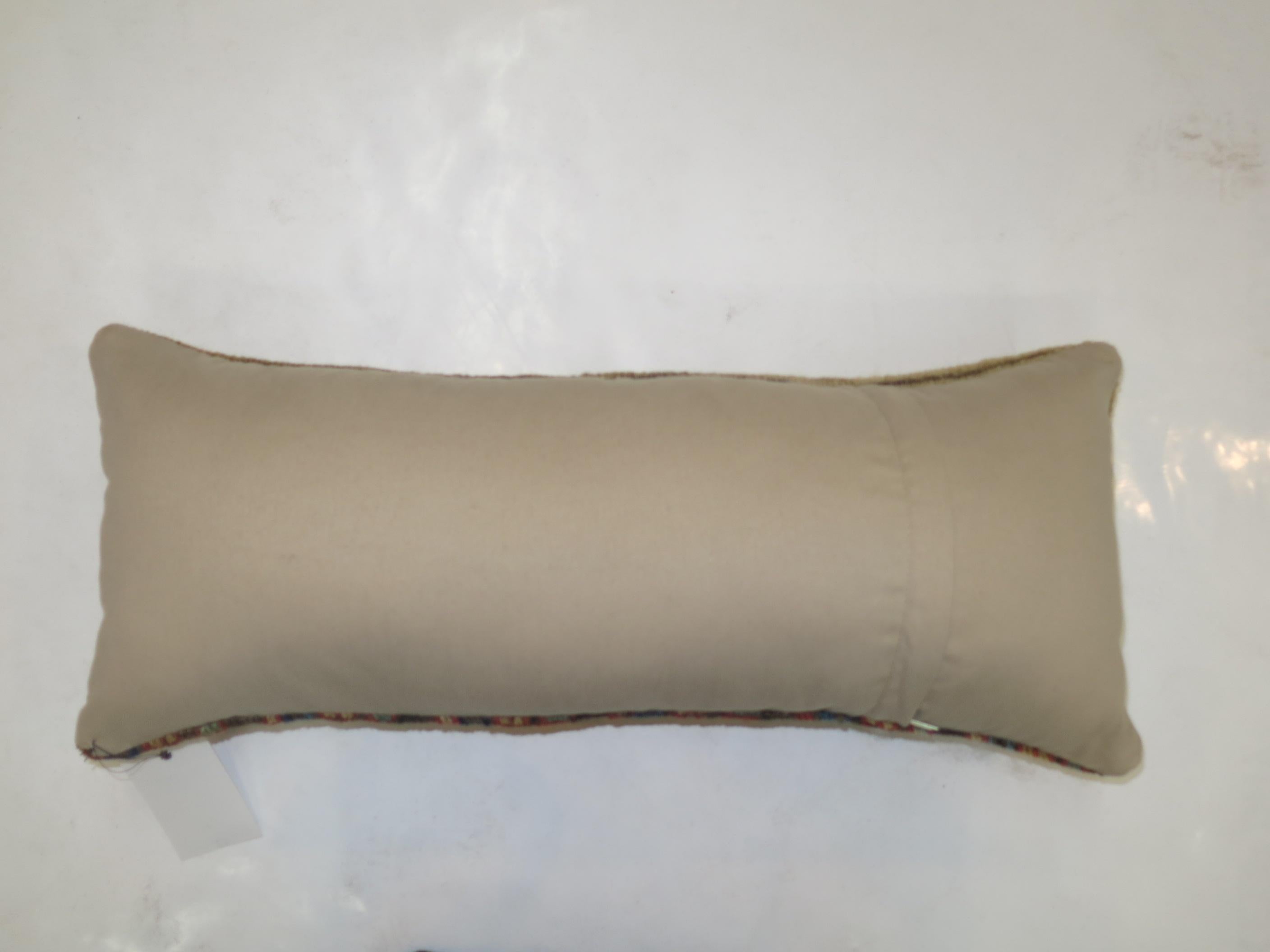 Pillow made from a border of an early 20th century Persian Serab rug.

11'' x 19''