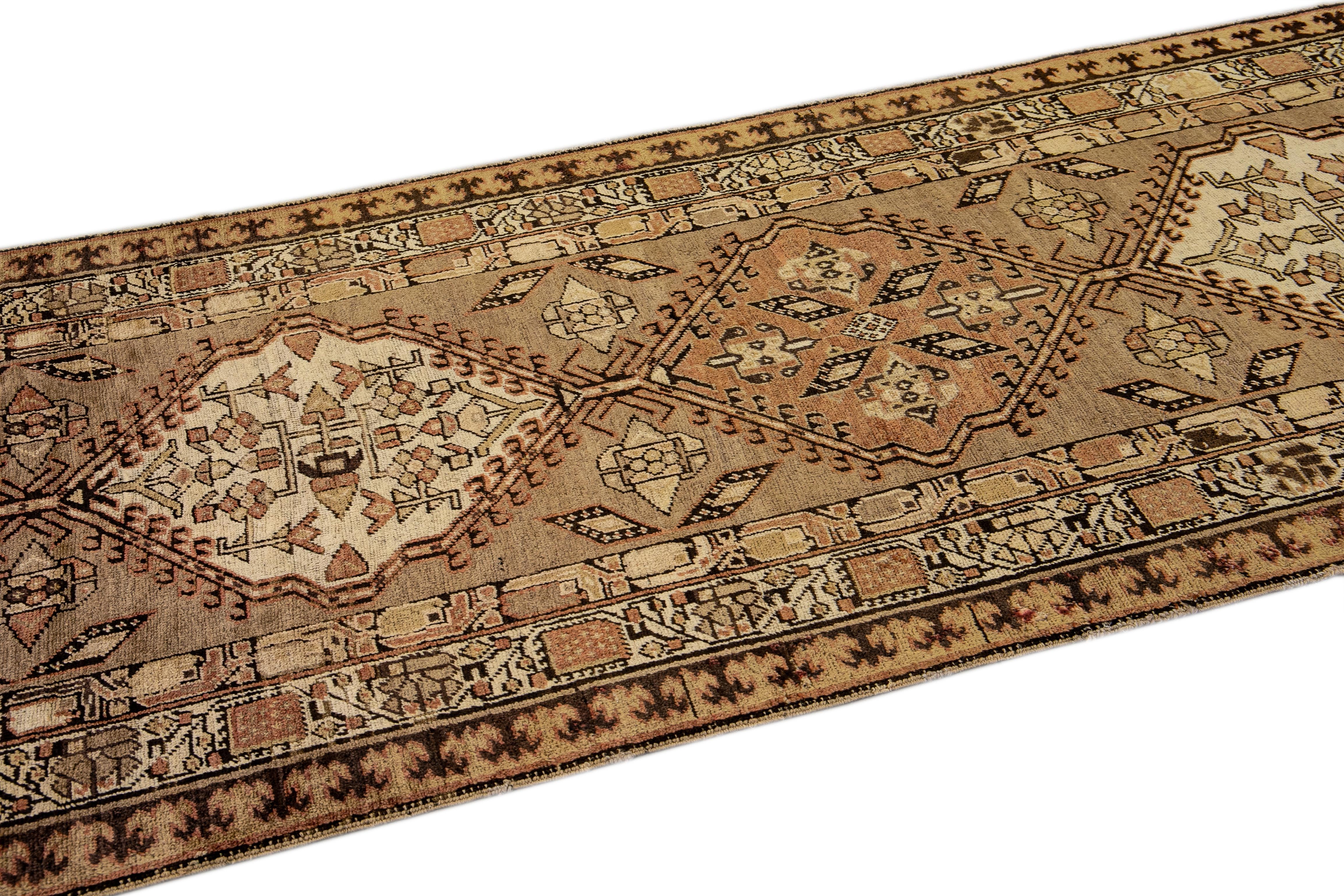 Early 20th Century Antique Persian Serab Handmade Tribal Tan Wool Runner For Sale