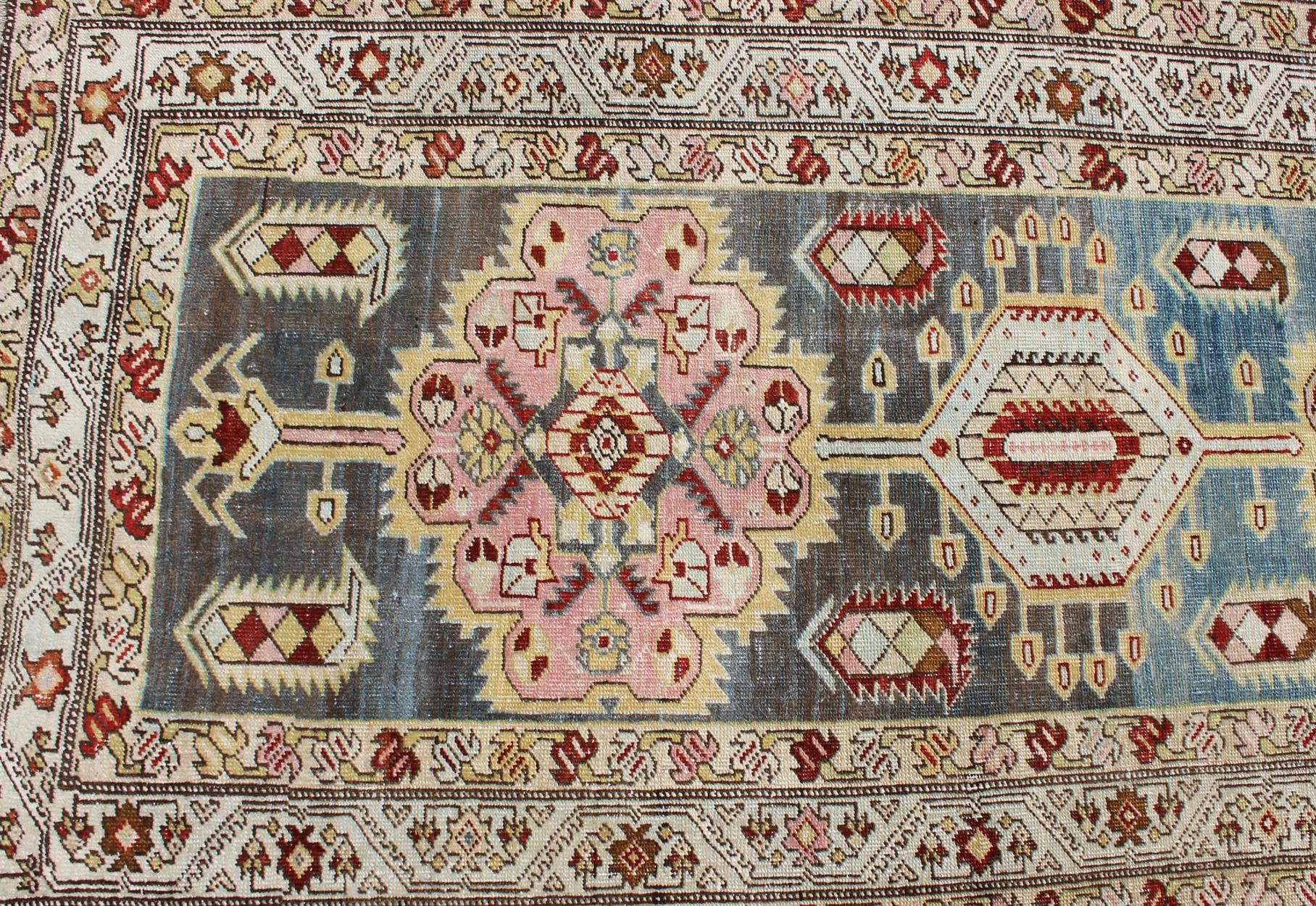 Early 20th Century Antique Persian Serab Runner with Geometric Medallion Design in Red and L.Blue For Sale
