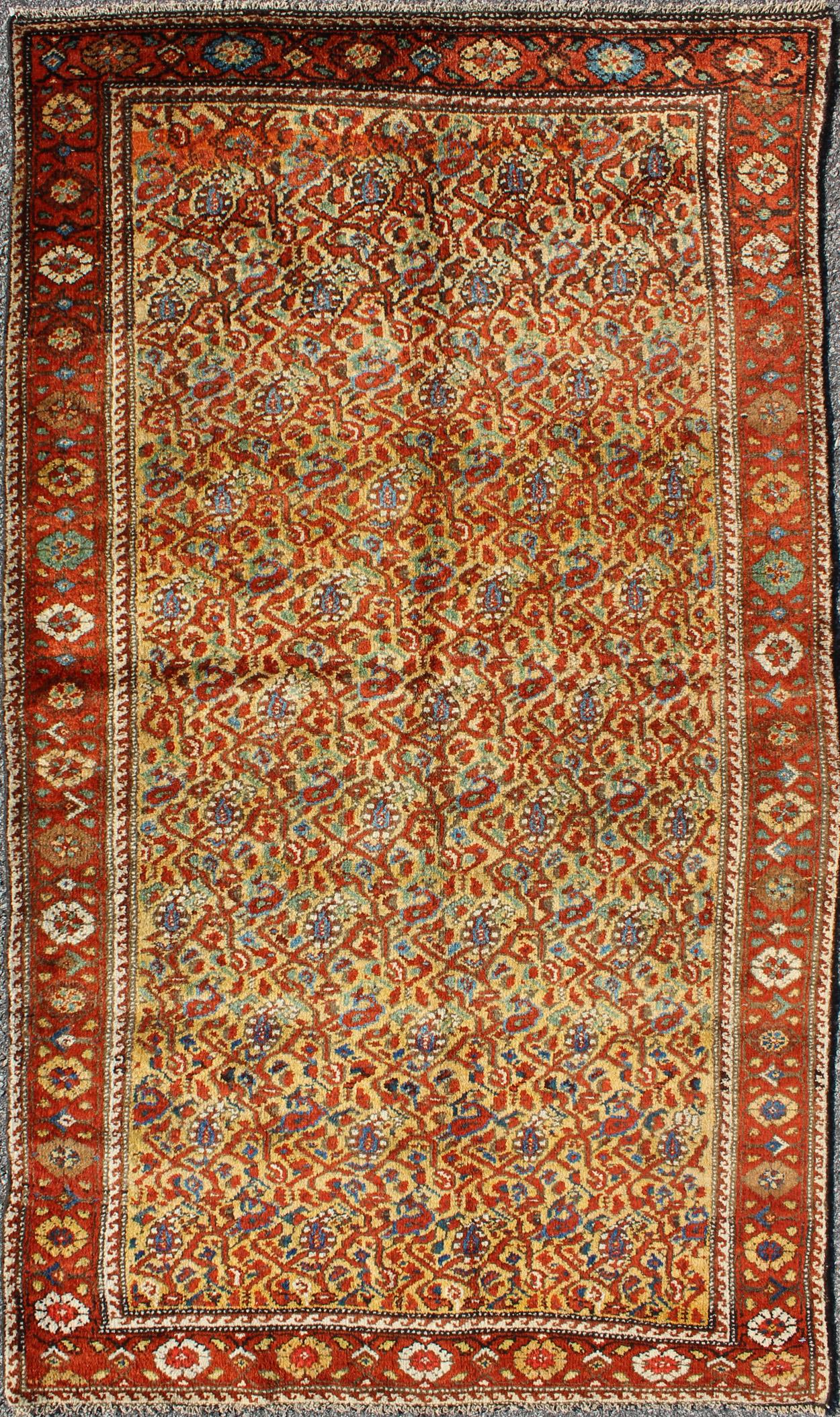 Antique Persian Seraband Rug with Repeating Boteh Pattern in Rust, Blue, and Tan For Sale 1