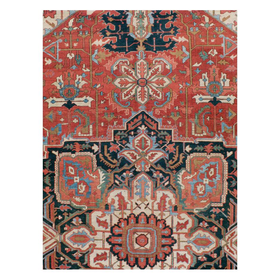 An antique Persian Serapi 15' x 22 oversize rug handmade during the early 20th century.

Measures: 15' 2