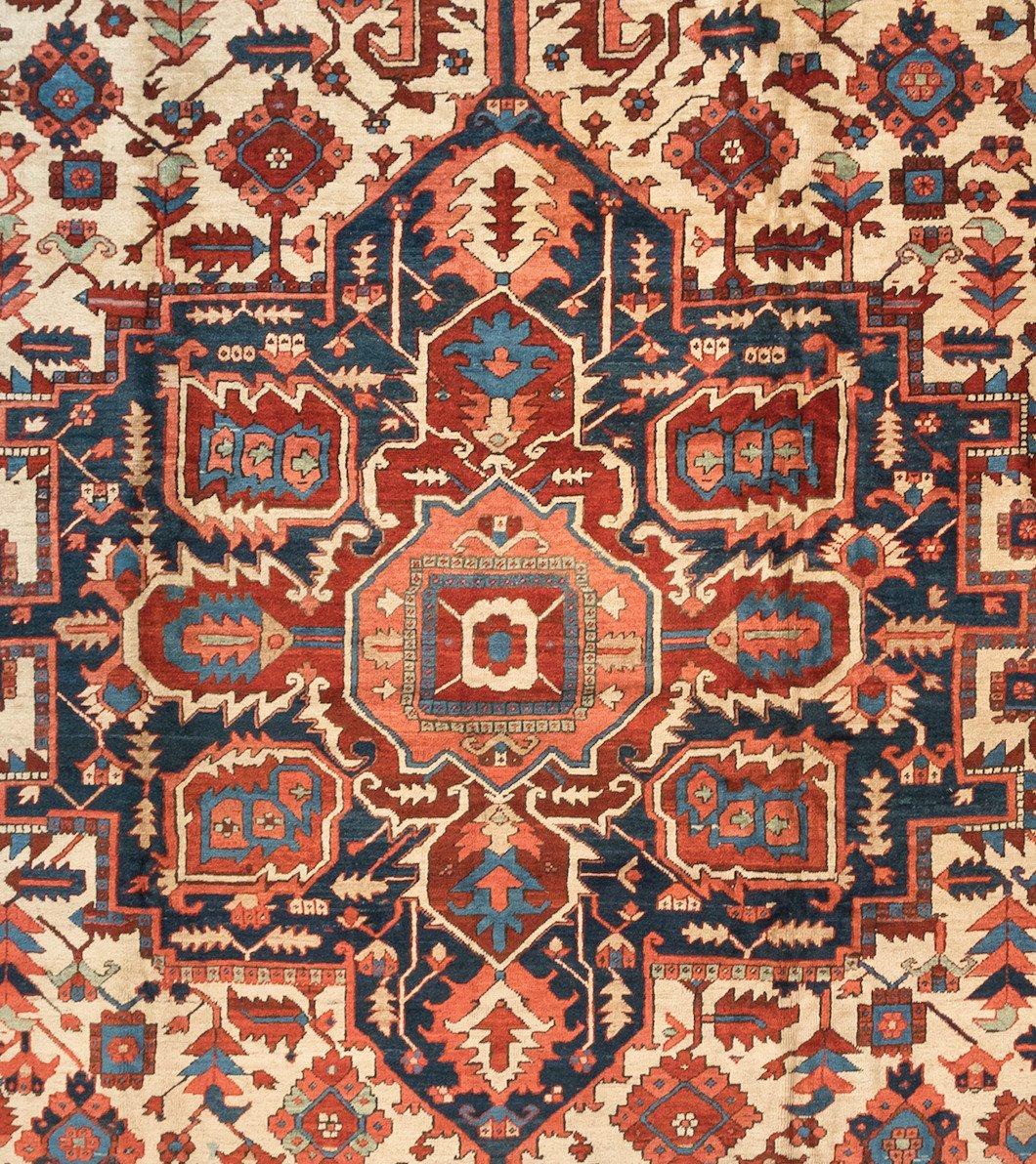 This is a rare, exquisite hand-knotted antique Serapi carpet with a medallion geometric design from circa 1875-1880. This rug measures 13 x 21.2 ft. and is in pristine condition.

Fine 19th Century antique Serapi carpets include some of the most