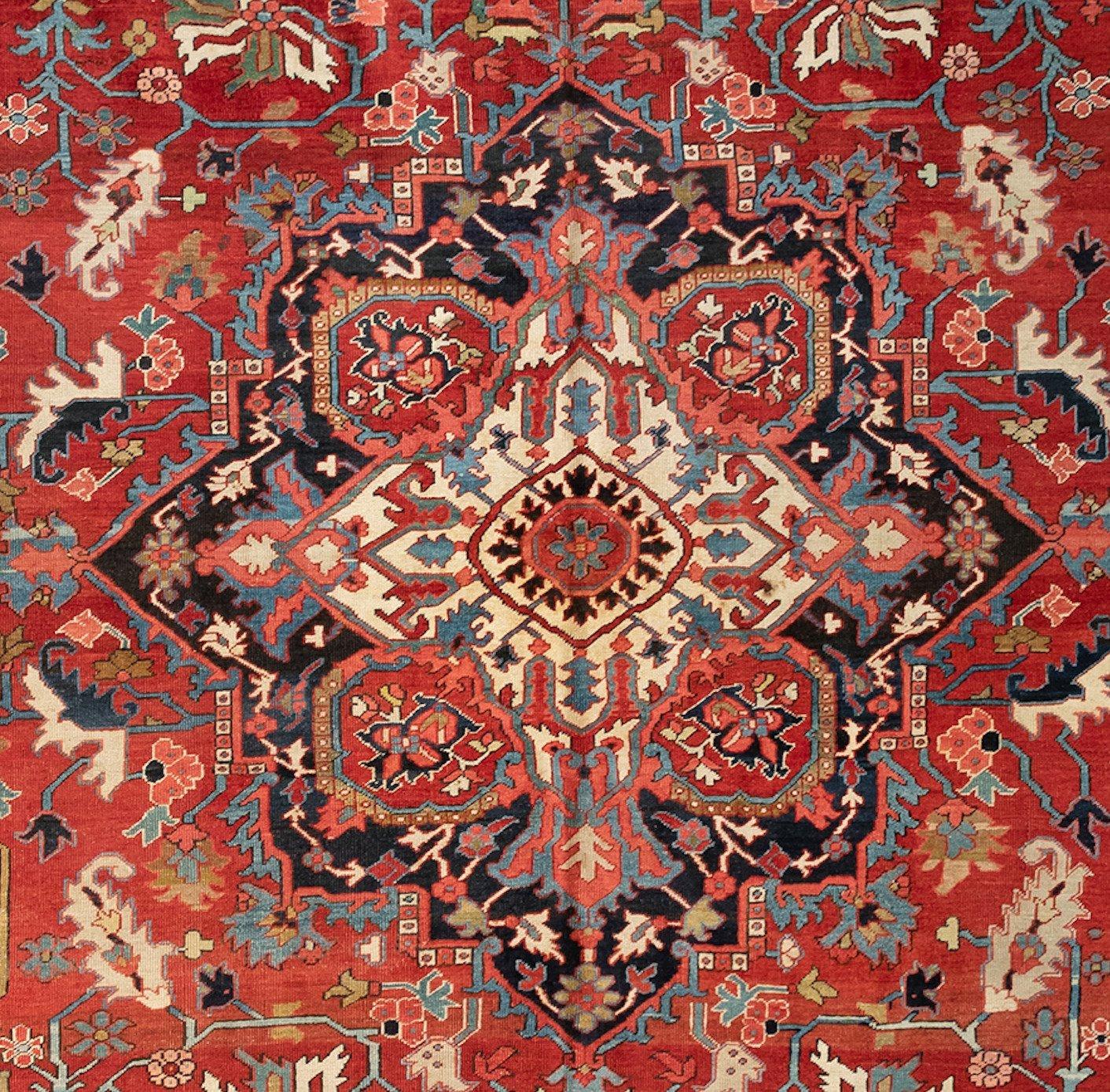 This is a lovely hand knotted antique Serapi carpet with a medallion from the 1900-1910s. This square rug measures 9.10 x 11.11 ft.
