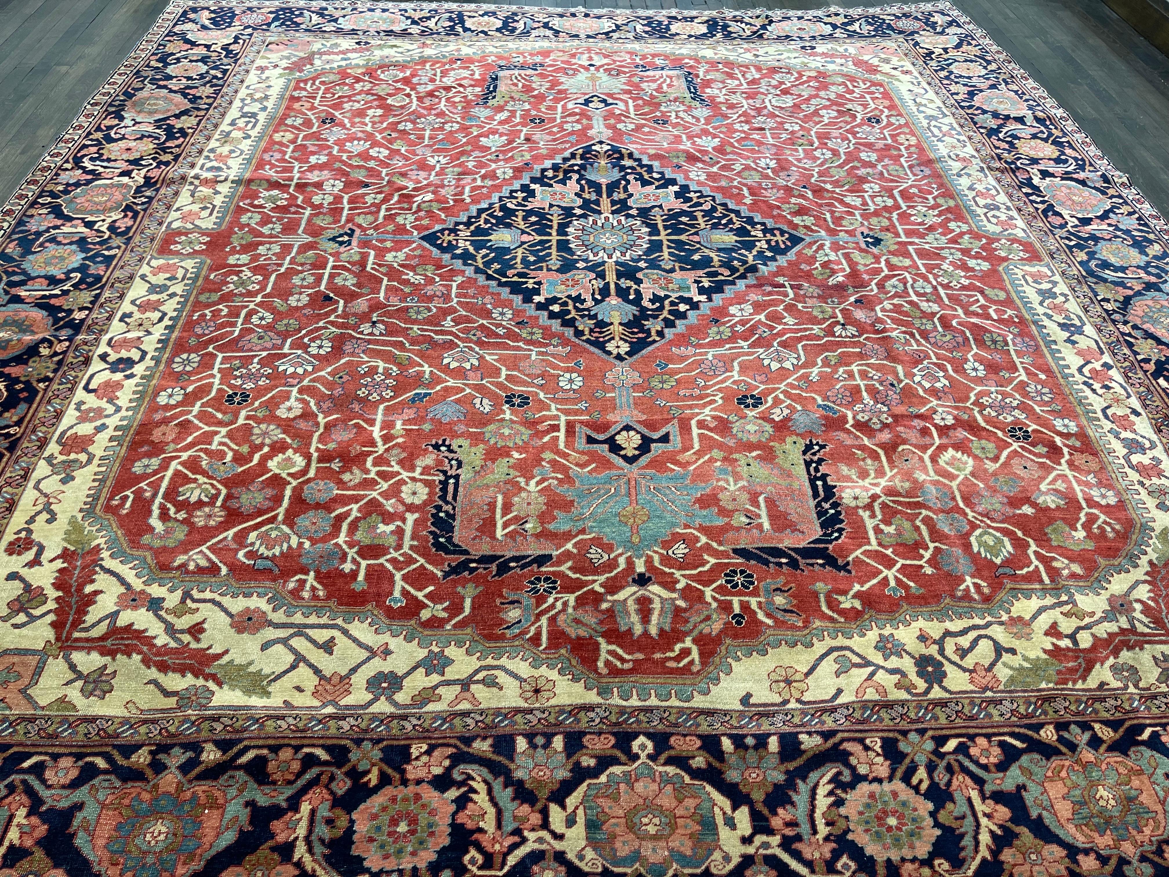 This very unique and one of a kind square rug was hand woven in the area of Serapi located northwest of Persia. Made with hand spun wool and all organic dyes, this rug has a square shaped medallion surrounded by simple,angular vines and spandrel