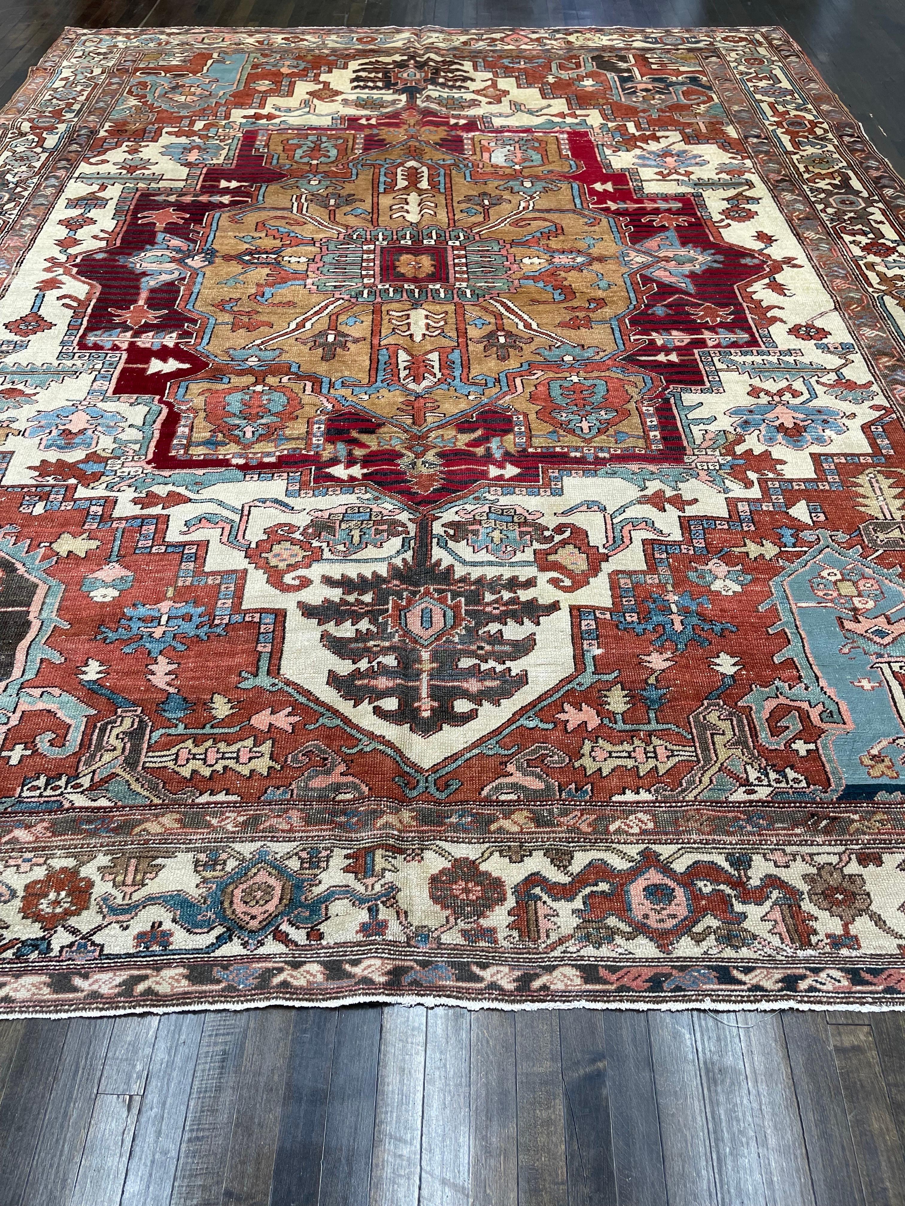 This rug is handmade in Serapi area located northwest of Iran. Heriz/Serapi carpets are woven on both a workshop and a cottage industry basis in hundreds of villages throughout the area. Designs have remained unchanged for thousands of years: a huge