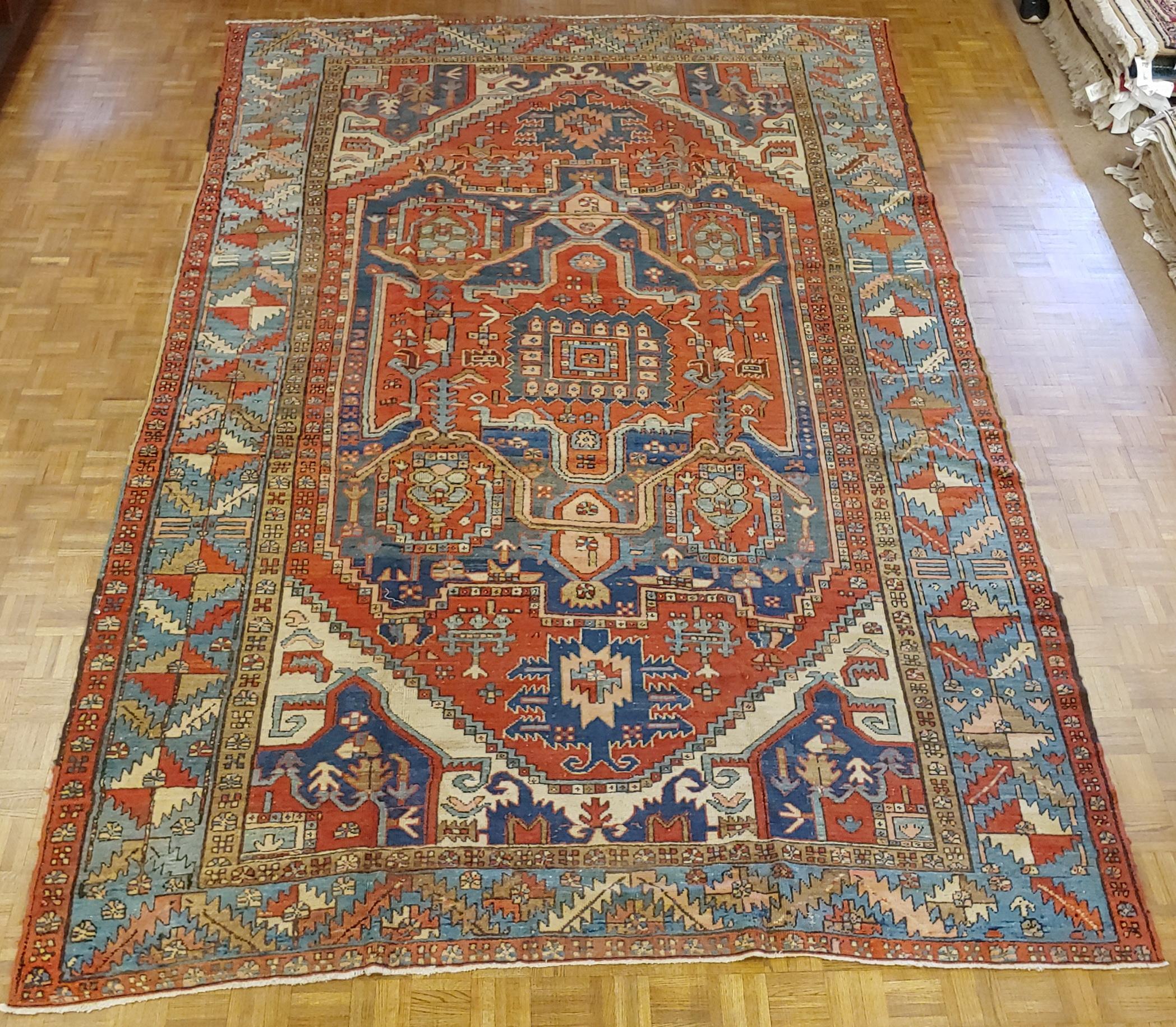 Woven Antique Persian Serapi Old Heriz, Primitive Motif, Wool, Room Size, 1890 For Sale
