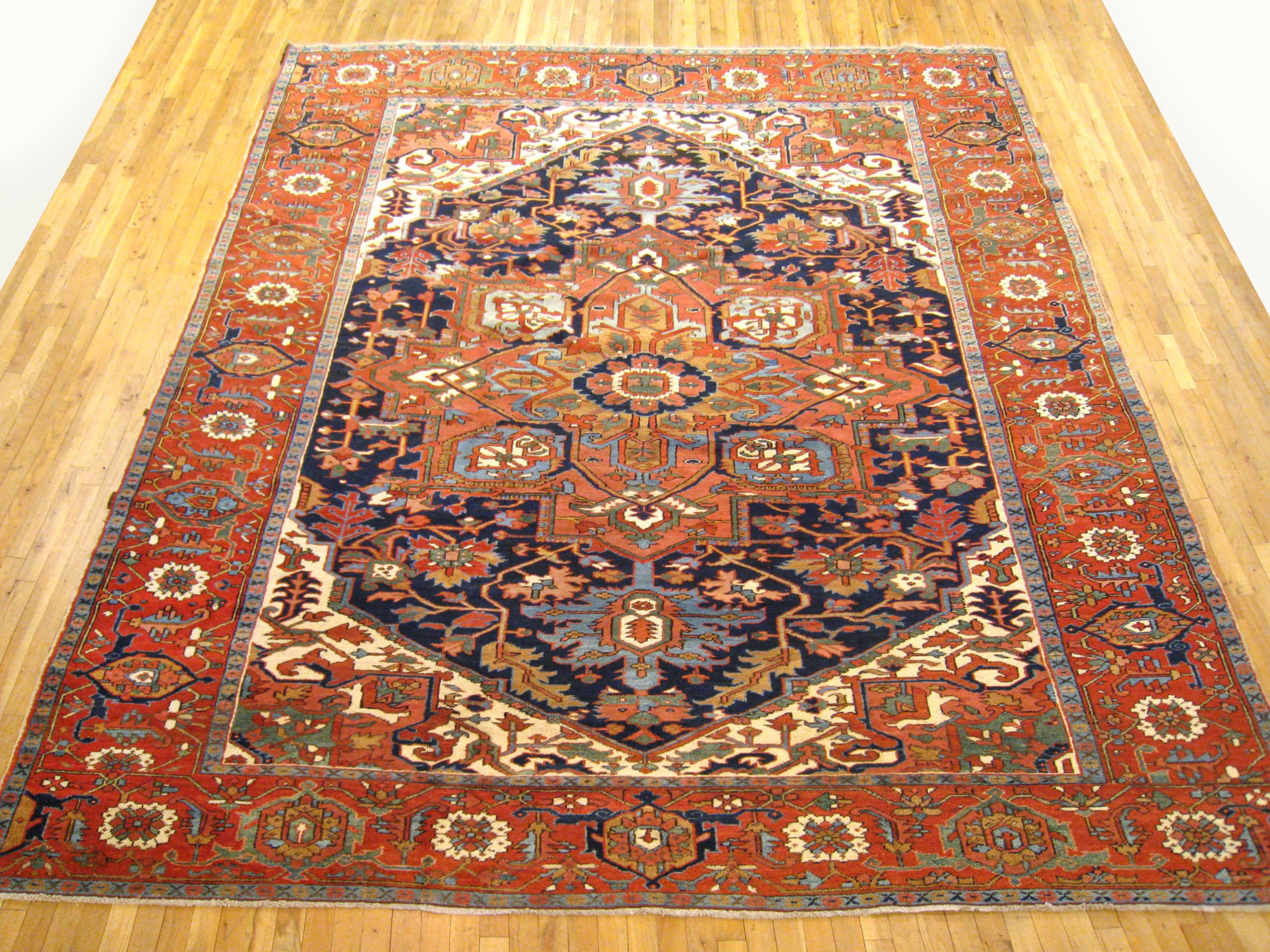 Antique Persian Serapi Oriental rug, in Room size

An antique Persian Serapi oriental rug, size 12'7