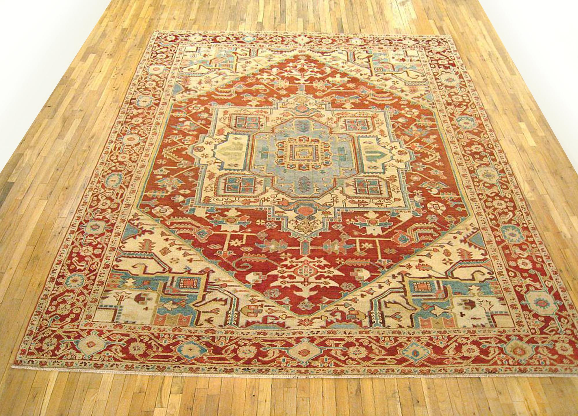 Antique Persian Serapi oriental rug, in room size

An antique Persian Serapi oriental rug, size 11'5