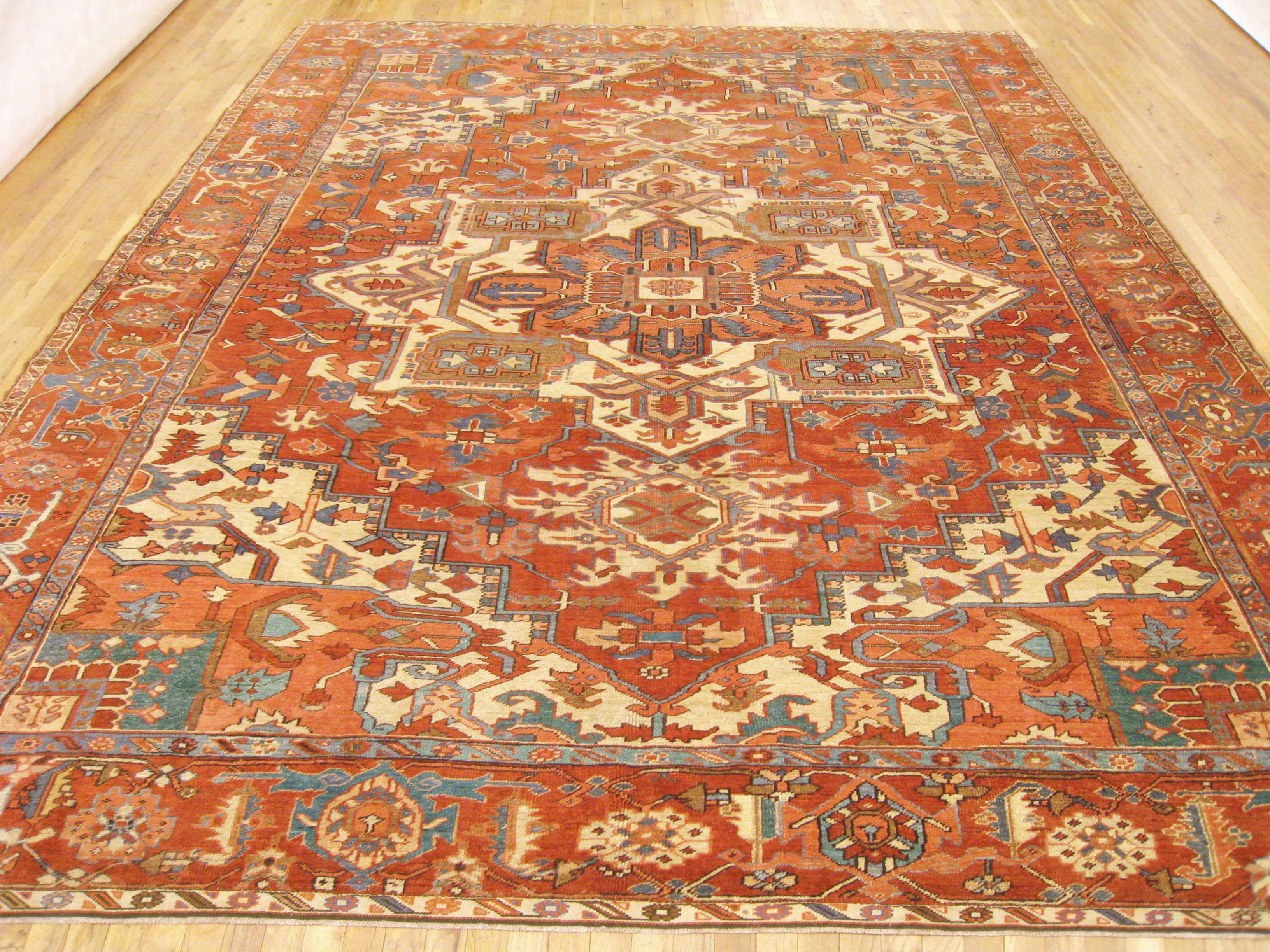 Hand-Knotted Antique Persian Serapi Oriental Carpet, in Room Size, with Central Medallion For Sale