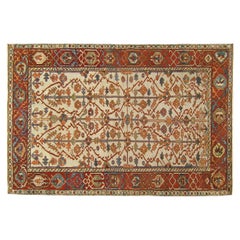 Antigua alfombra oriental persa Serapi, de pequeño tamaño, con diseño simétrico