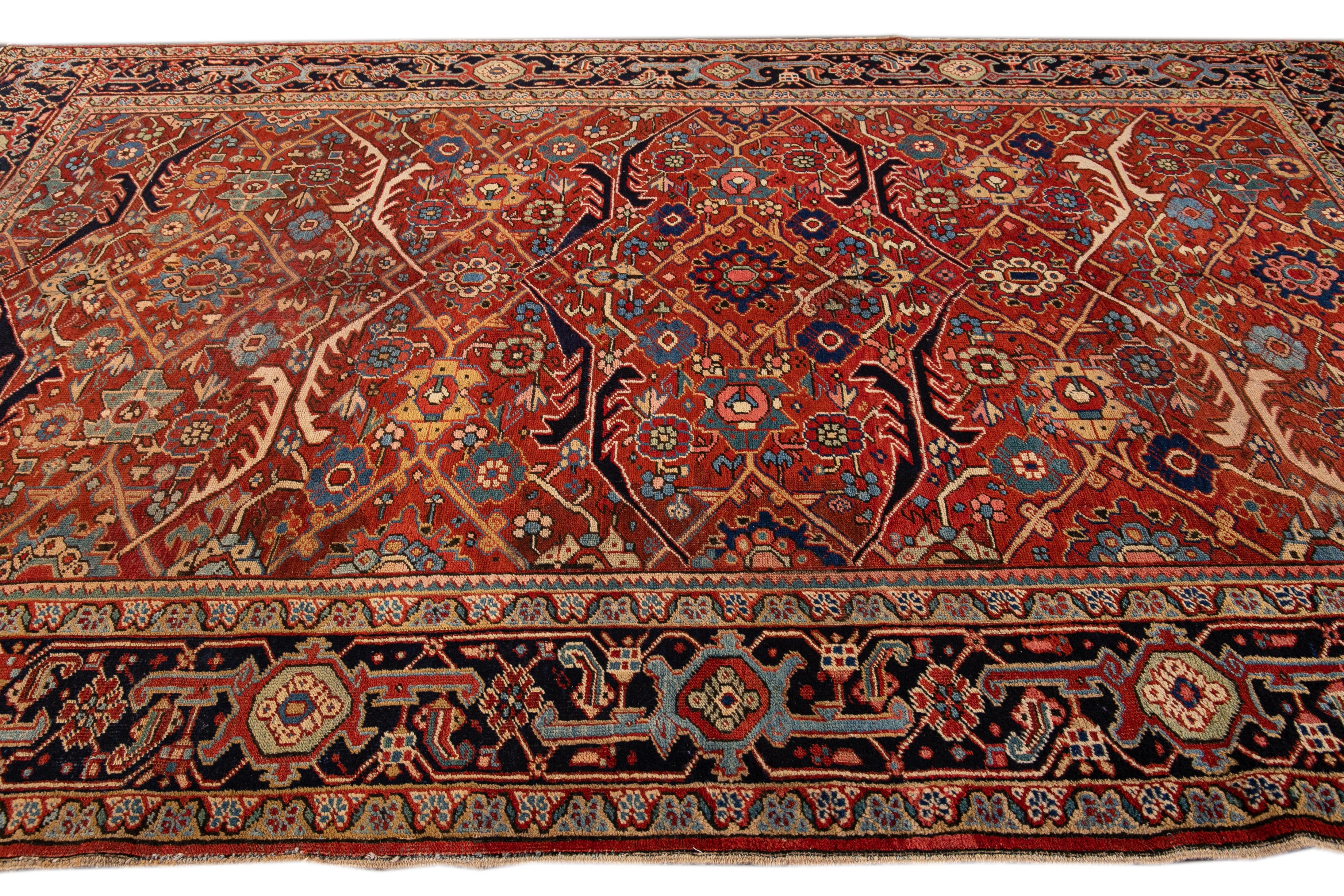 Early 20th Century Antique Persian Serapi Red Handmade Medallion Floral Wool Rug For Sale
