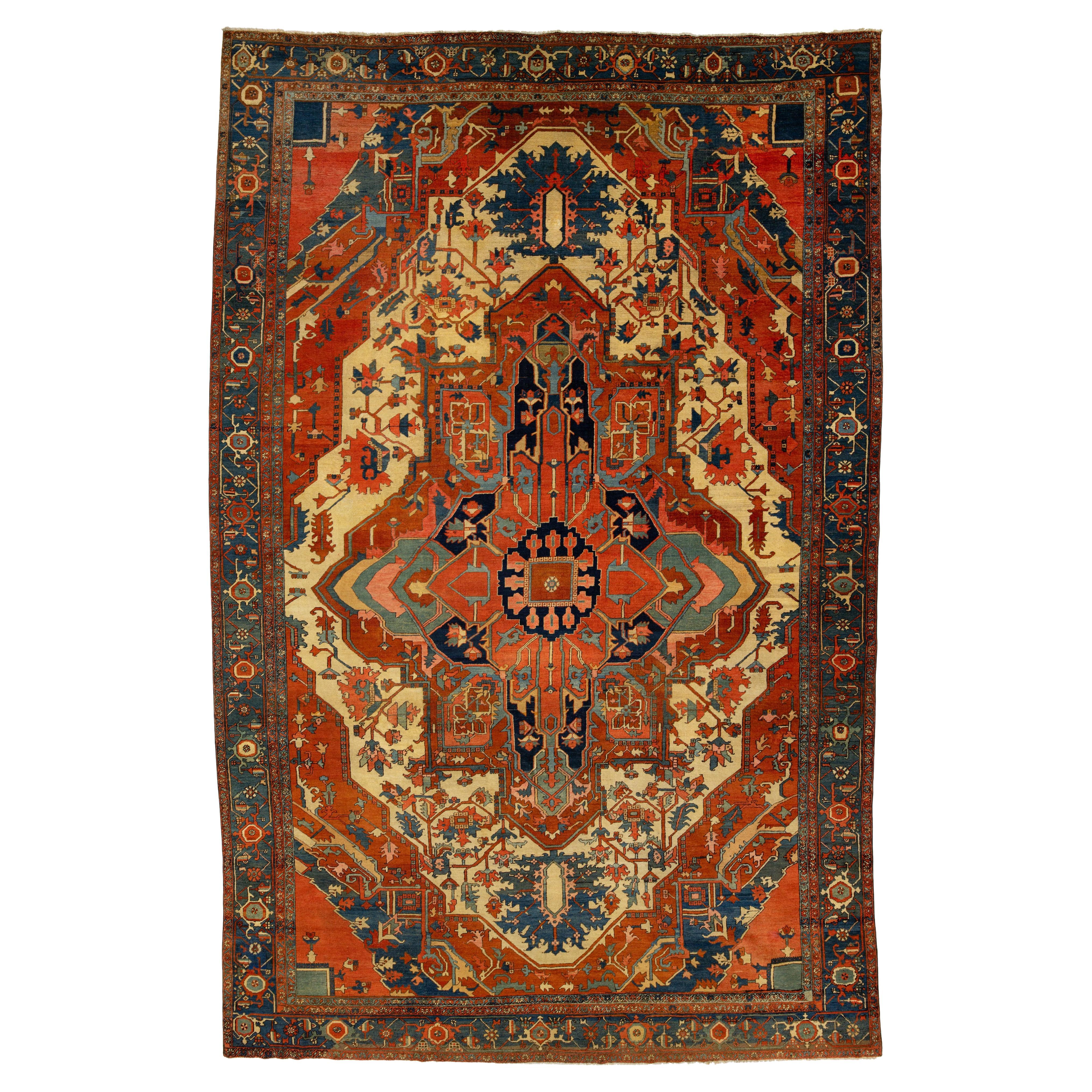Antique Persian Serapi Red Wool Rug Featuring a Medallion Design im Angebot