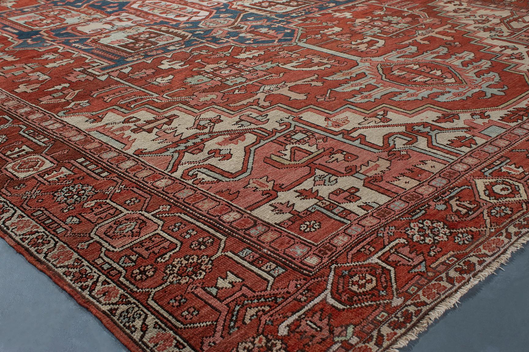 Antique Serapi rugs originated in Northwest Iran and are characterized by their finer weave with large-scale, spaciously placed designs. The majority of antique Serapis have medallions, but they can also be found with large-scale all-over patterns.