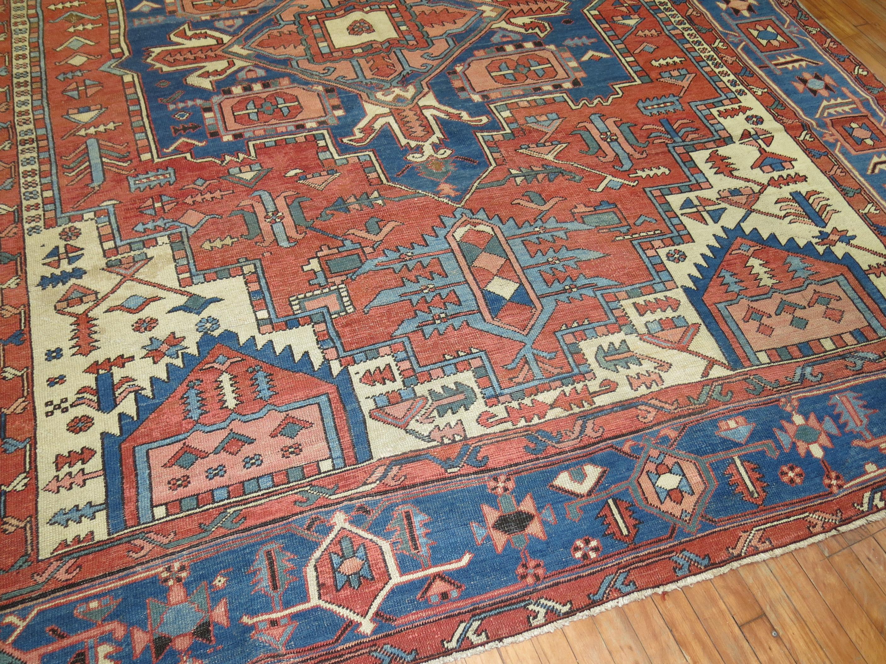 Spacious room-size antique Persian serapi room size rug.

9'6'' x 11'9''

Antique Serapi carpets were woven on the level of a family or small workshop with multiple weavers working several years to complete each Persian rug. The weaving was done