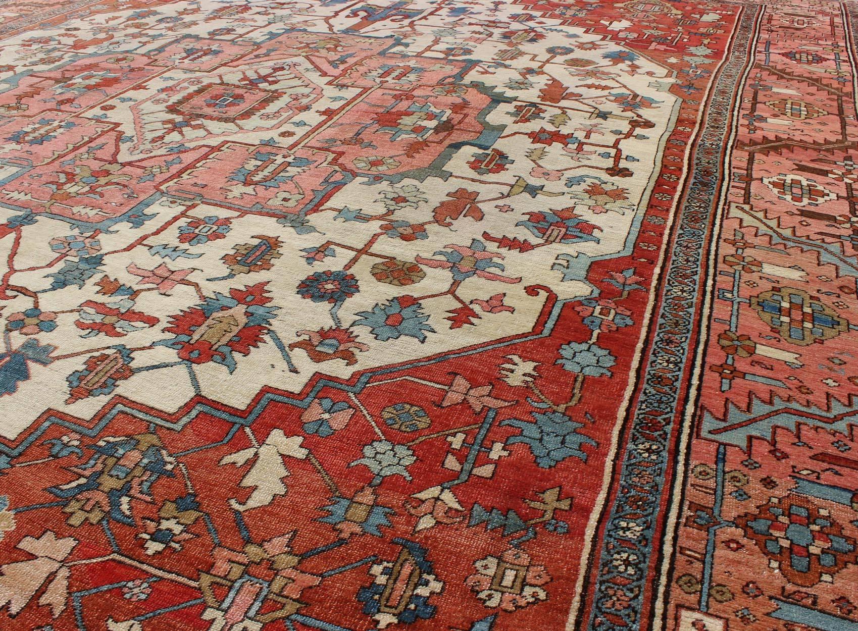 Hand-Knotted Antique Persian Serapi Rug in Squared Shape with  Ivory, Salmon, Brick Red For Sale