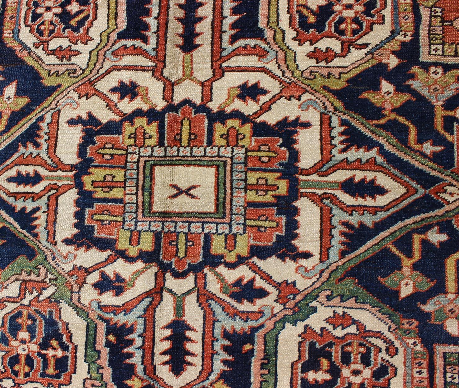 Antique Persian Serapi Rug with Bold Medallion in Orange, Navy Blue and Green 1