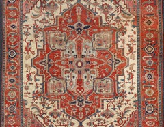Antique Persian Serapi Rug with Ivory Background & Detailed Layered Medallion