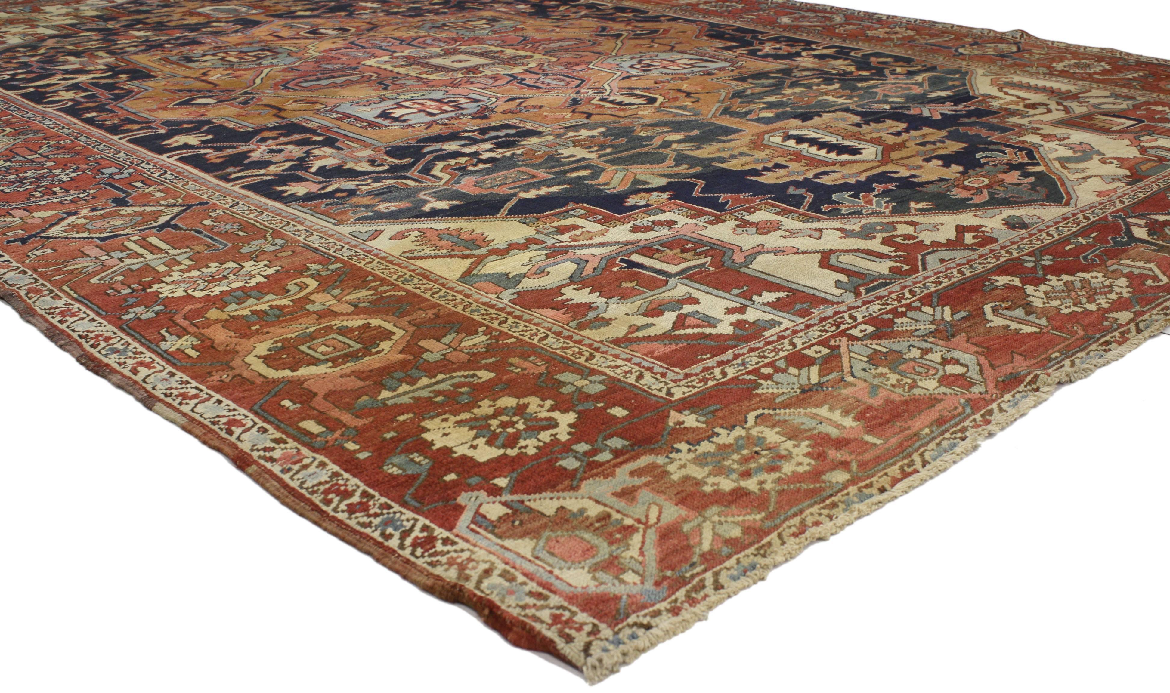77051 antique Persian Serapi rug with traditional modern style. This antique Persian Serapi rug with traditional modern style features a relaxed, eclectic look that’s adaptable without a strict, coherent theme. From the large-scale center medallion