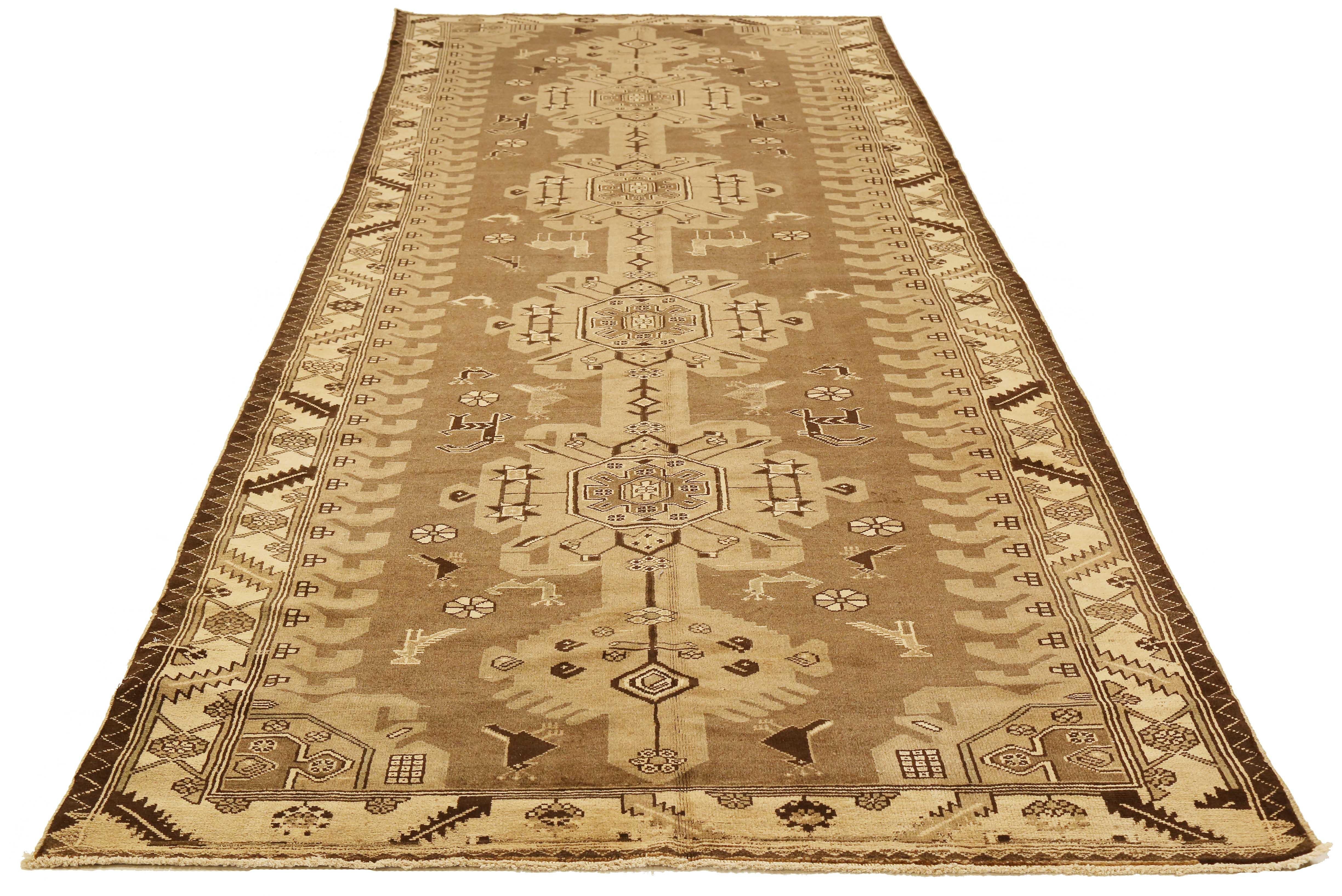 Antique Persian rug handwoven from the finest sheep’s wool and colored with all-natural vegetable dyes that are safe for humans and pets. It’s a traditional Shahsavan design highlighted by geometric medallions on the centerfield. It’s a beautiful