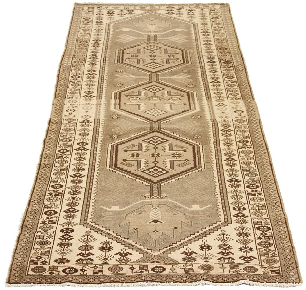 Antique Persian rug handwoven from the finest sheep’s wool and colored with all-natural vegetable dyes that are safe for humans and pets. It’s a traditional Shahsavan design highlighted by geometric medallions on the centerfield that gives the rug a