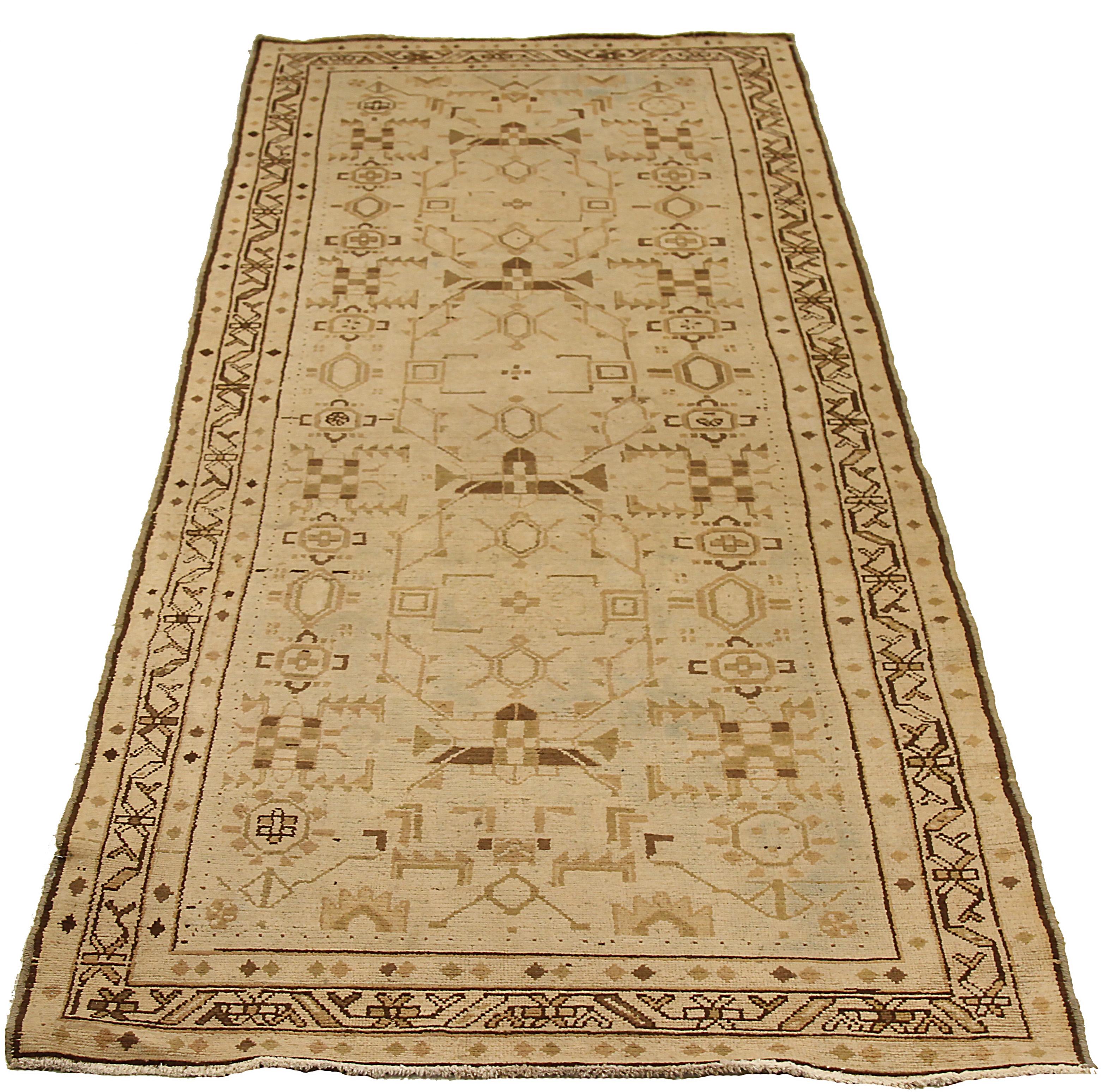 Antique Persian runner rug handwoven from the finest sheep’s wool and colored with all-natural vegetable dyes that are safe for humans and pets. It’s a traditional Shahsavan design highlighted by geometric medallions on the centerfield. It’s a