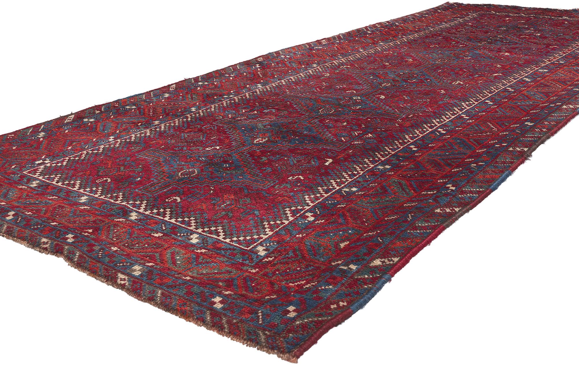 61239 Vintage Persian Tribal Shiraz Rug, 04'00 x 10'04. In this exquisite hand-knotted wool vintage Persian Shiraz rug, the influence of the Qashqai Khamseh tribes is vividly woven into every fiber, creating a piece that is both captivating and