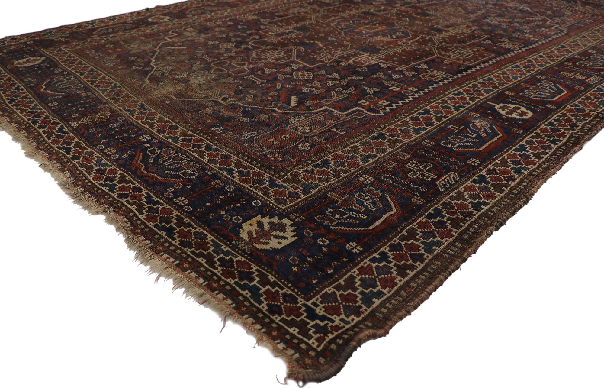 ?21690 Antique Persian Shiraz Rug, 06'10 x 09'01. Emanating nomadic charm with incredible detail and texture, this hand knotted wool antique Persian Shiraz rug is a captivating vision of woven beauty. The eye-catching tribal design and atmospheric