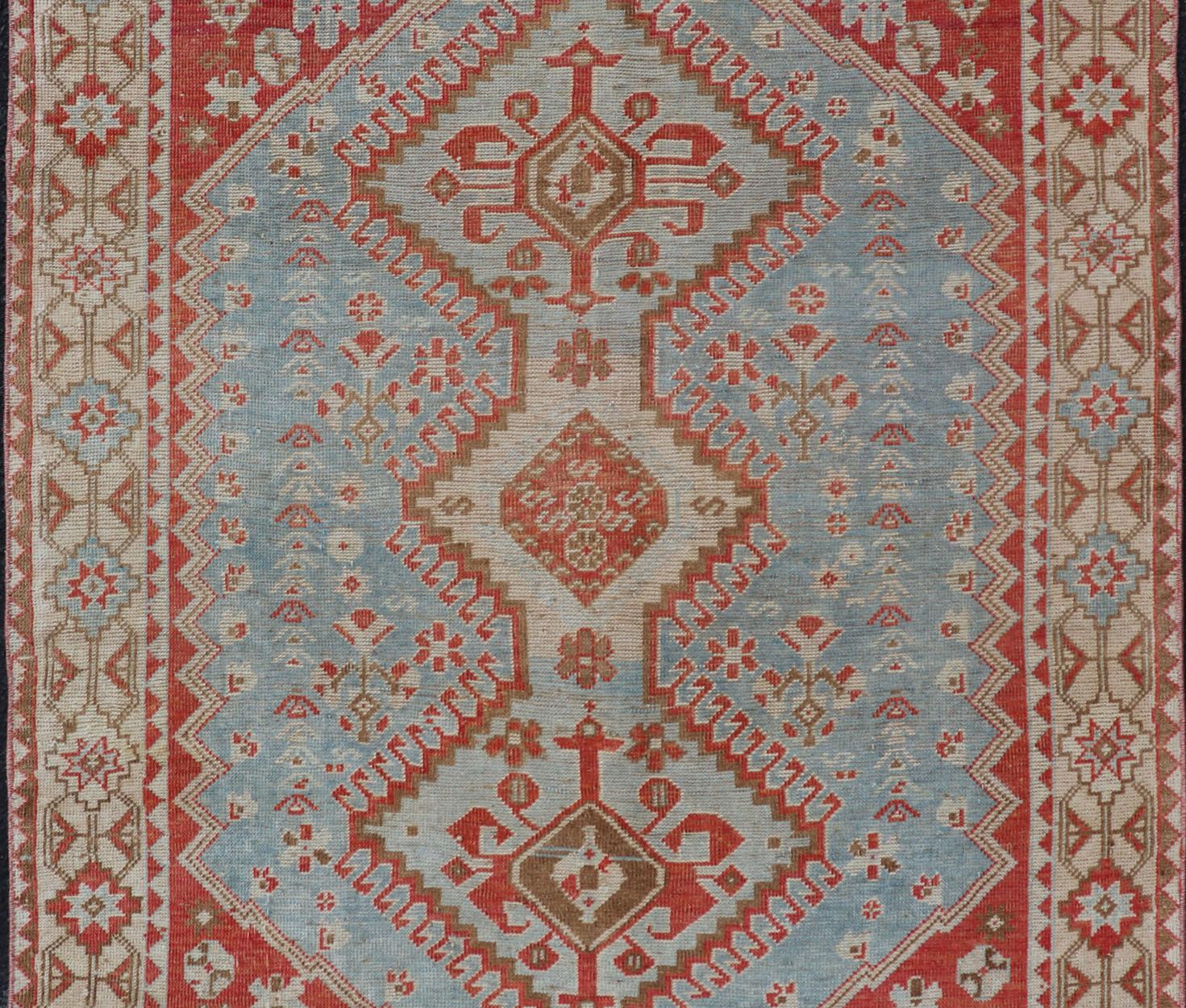 Tribal Antique Persian Shiraz Rug with Center Medallions and Sub Geometric Design For Sale