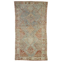 Antique Persian Shiraz Rug with Faded Earth-Tone Colors