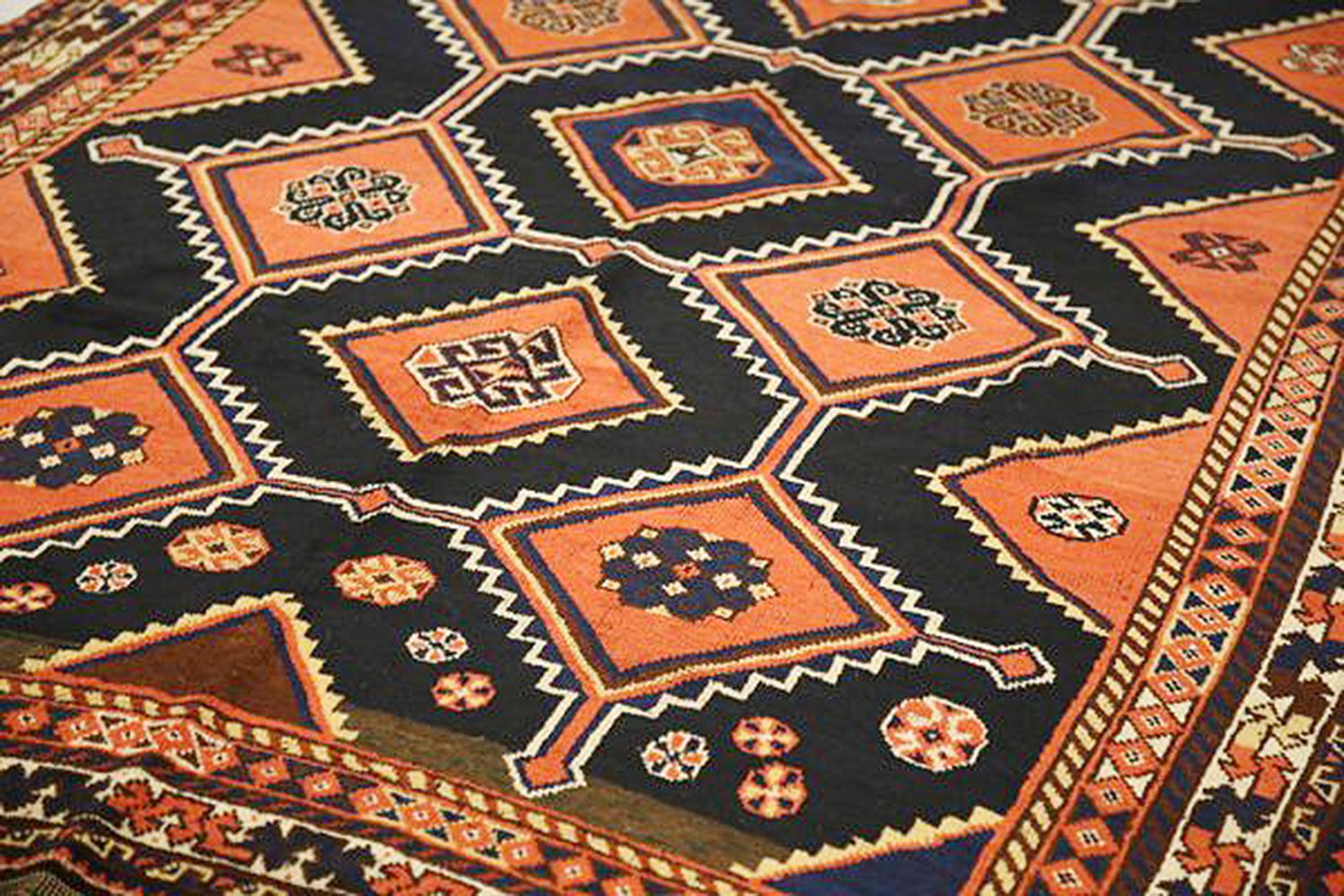 Other Antique Persian Shiraz Rug with Floral and Geometric Medallions on Black Field For Sale
