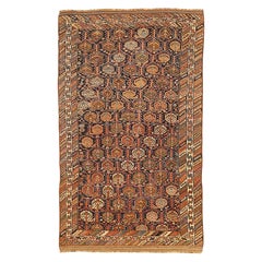 Tapis persan antique Shiraz avec médaillons floraux verts et bruns sur toute sa surface