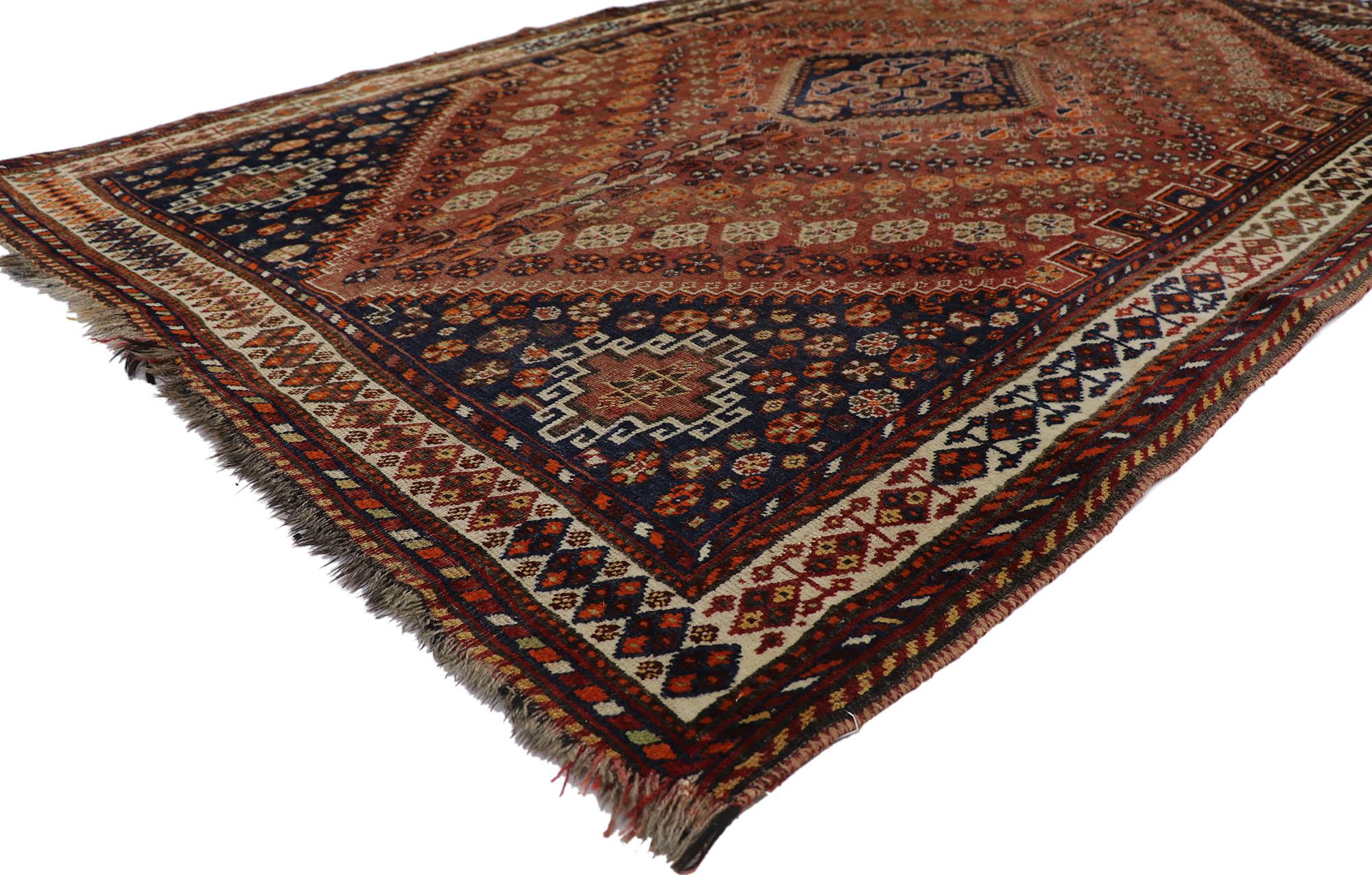 21698, antique Persian Shiraz rug with Mid-Century Modern Tribal style. With its rustic sensibility and tribal style, this hand-knotted wool antique Persian Shiraz rug will take on a curated lived-in look that feels timeless while imparting a sense