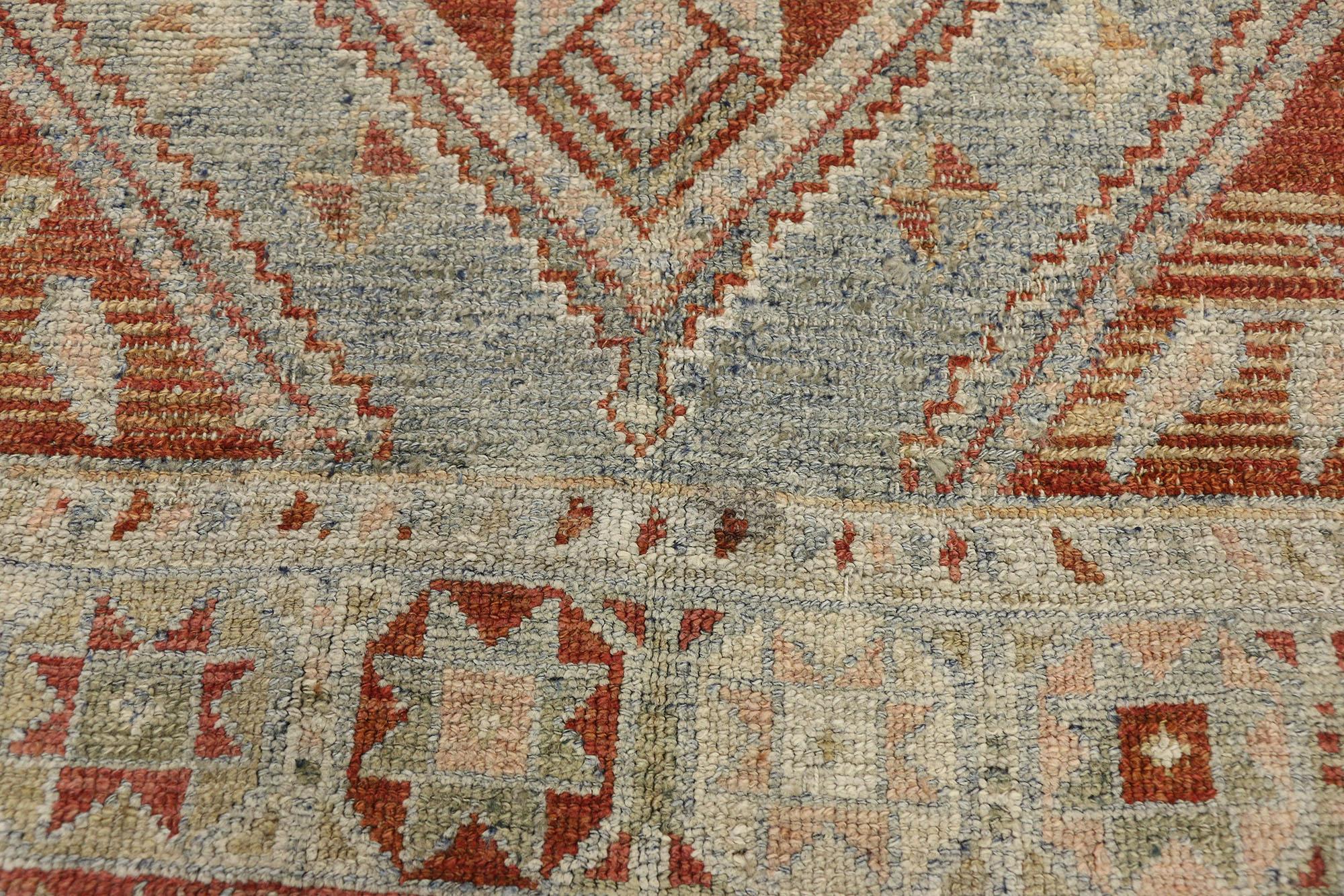 Rustic Antique Persian Shiraz Rug with Faded Earth-Tone Colors