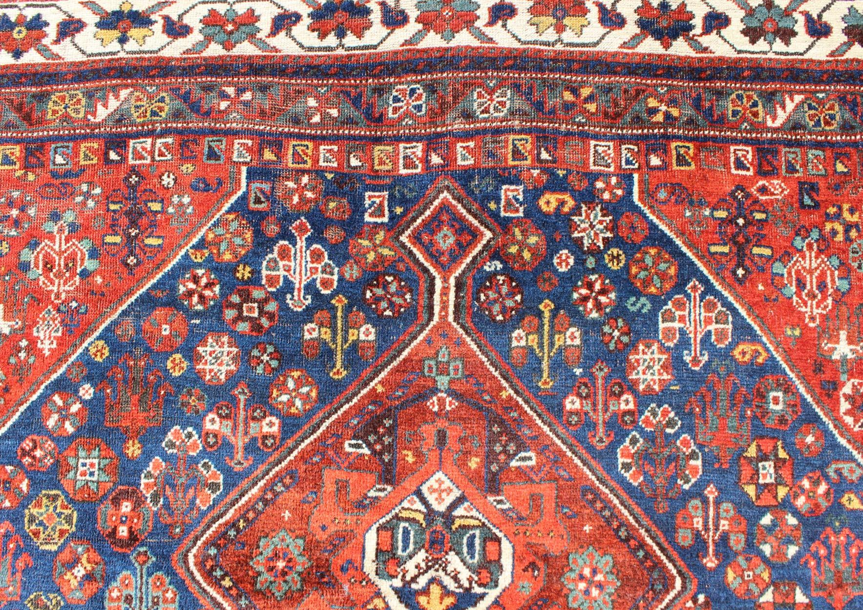 Wool Antique Persian Shiraz Rug with Tri-Medallion Geometrics in Royal Blue and Red For Sale