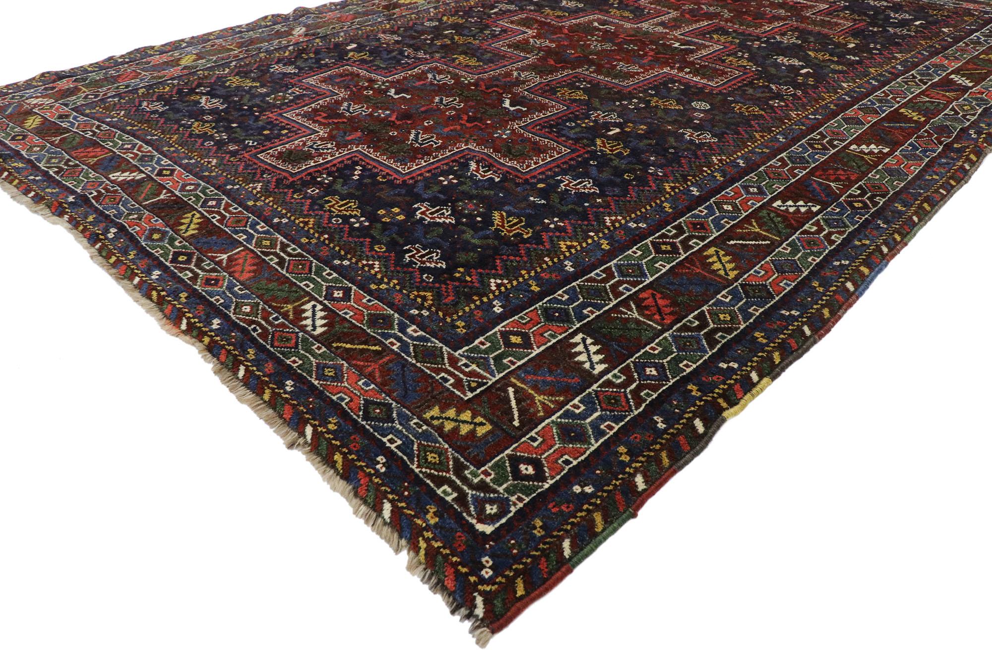 53396, antique Persian Shiraz rug with tribal style and nomadic charm. Embodying tribal style and understated elegance with rustic sensibility, this hand knotted wool antique Persian Shiraz rug is a captivating vision of woven beauty. A stepped pole