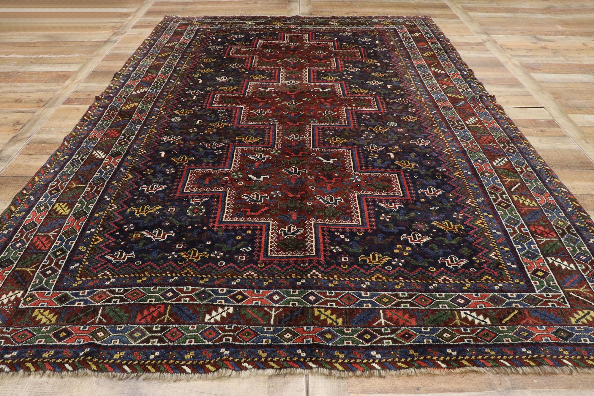 Wool Antique Persian Shiraz Rug with Tribal Style and Nomadic Charm For Sale