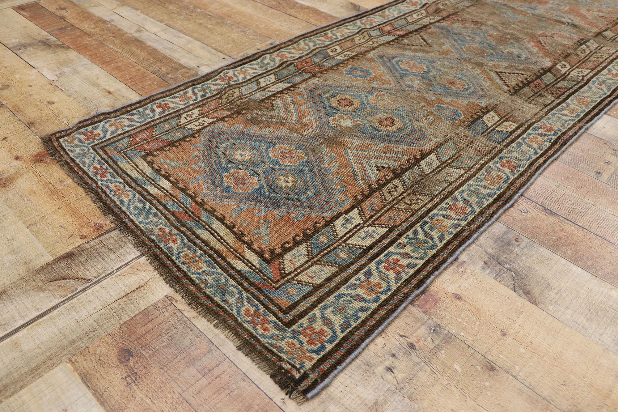 Wool Antique Persian Shiraz Runner with Rustic Tribal Style For Sale